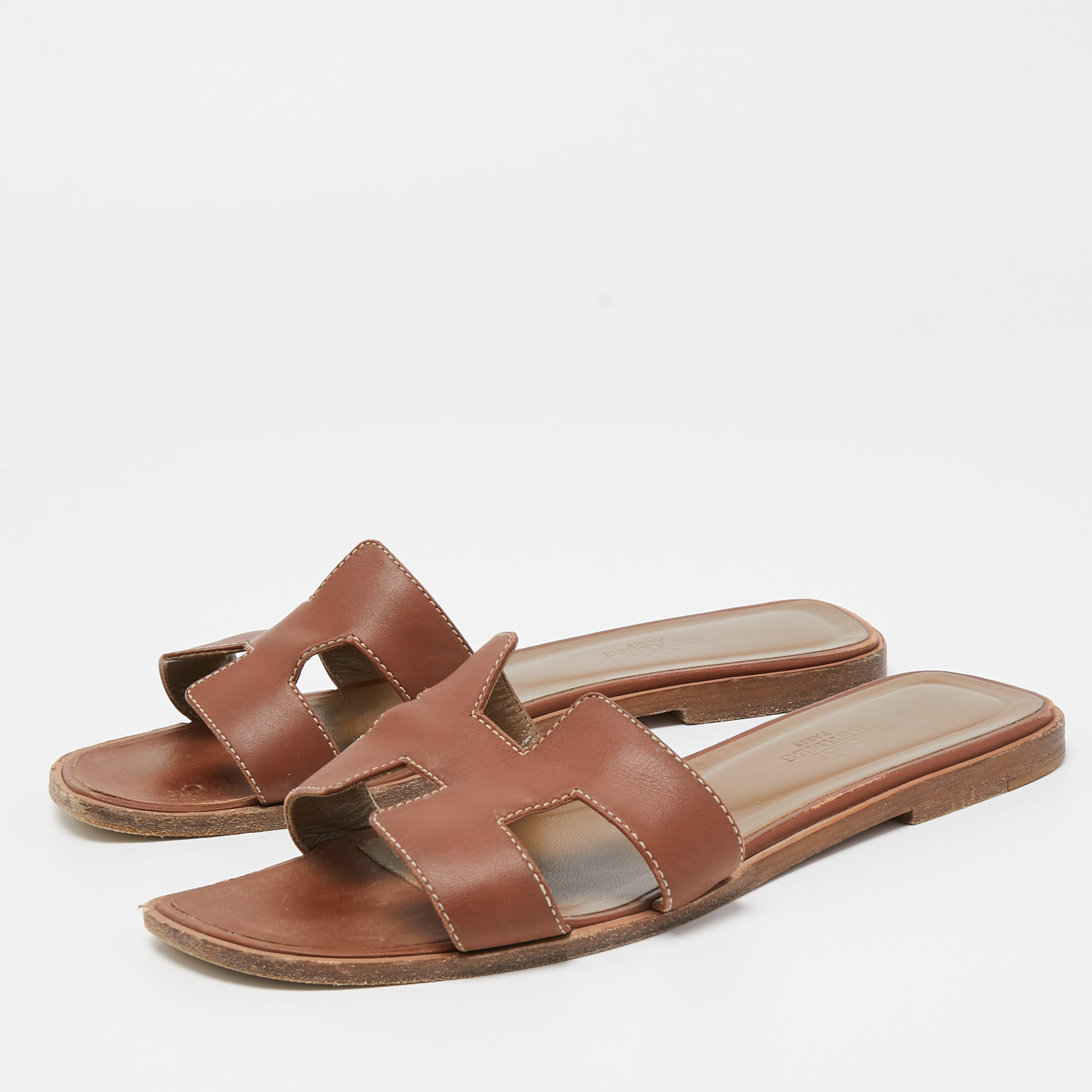 

Hermes Brown Leather Oran Flat Slides Size