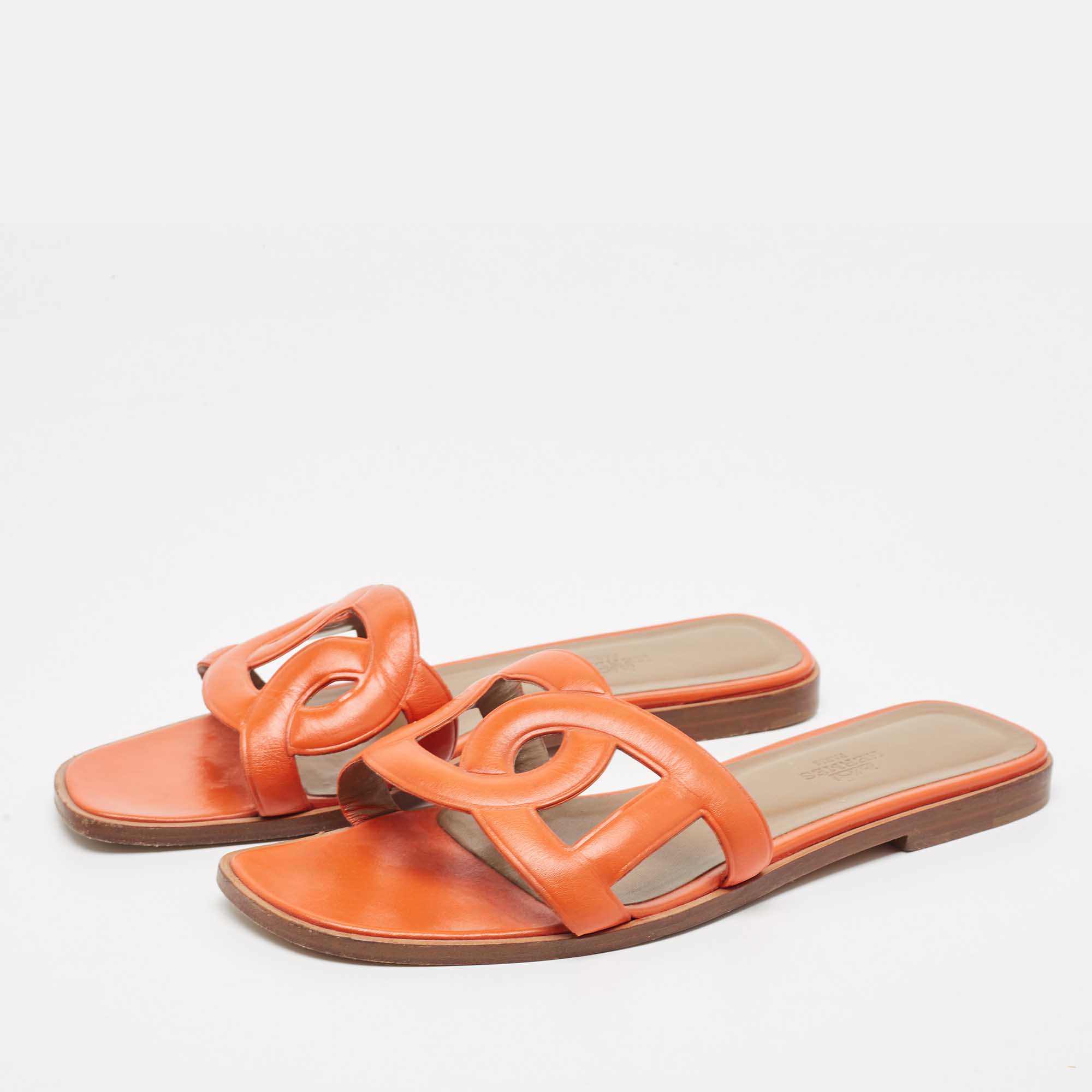 

Hermes Orange Leather Omaha Flat Slides Size