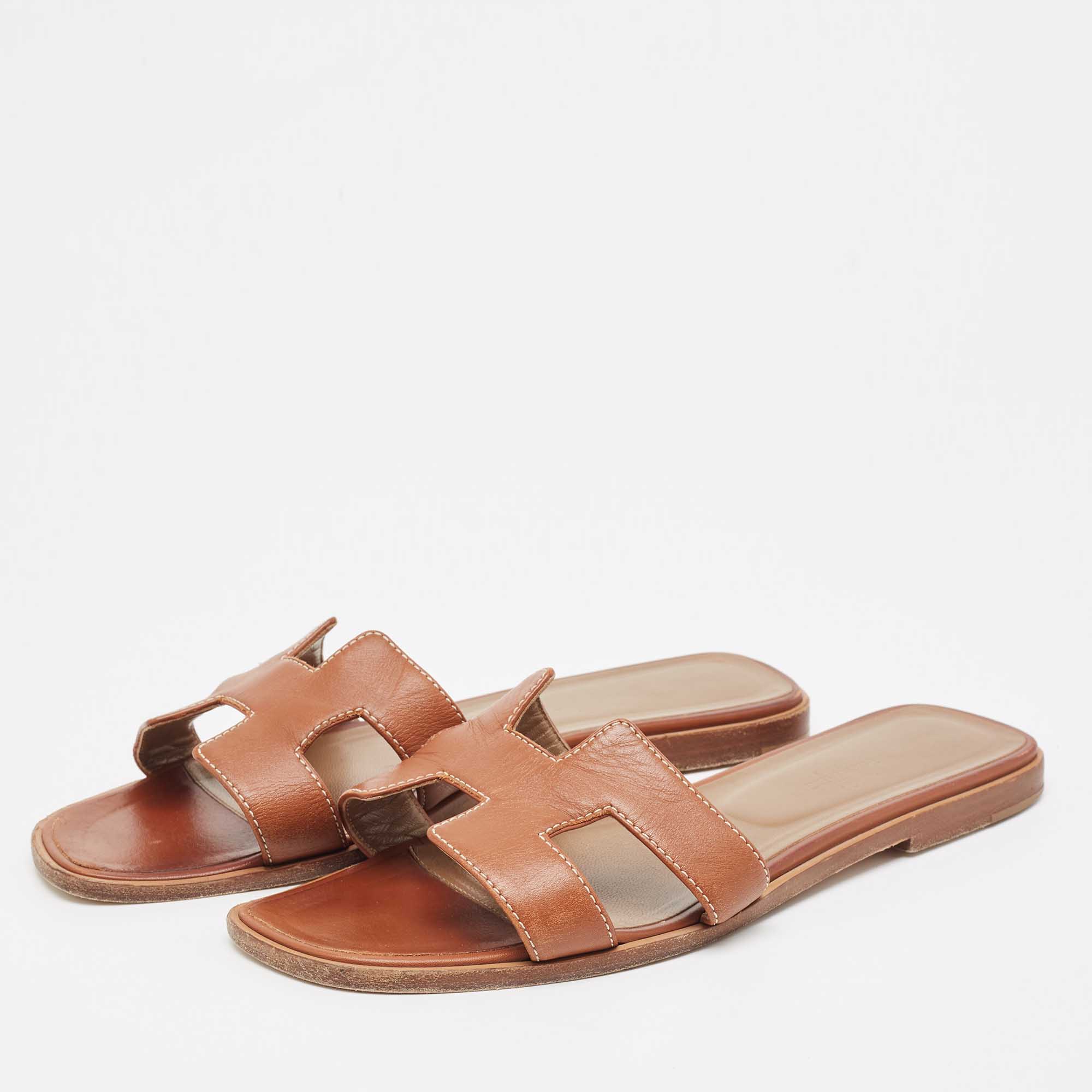 

Hermes Brown Leather Oran Flat Slides Size
