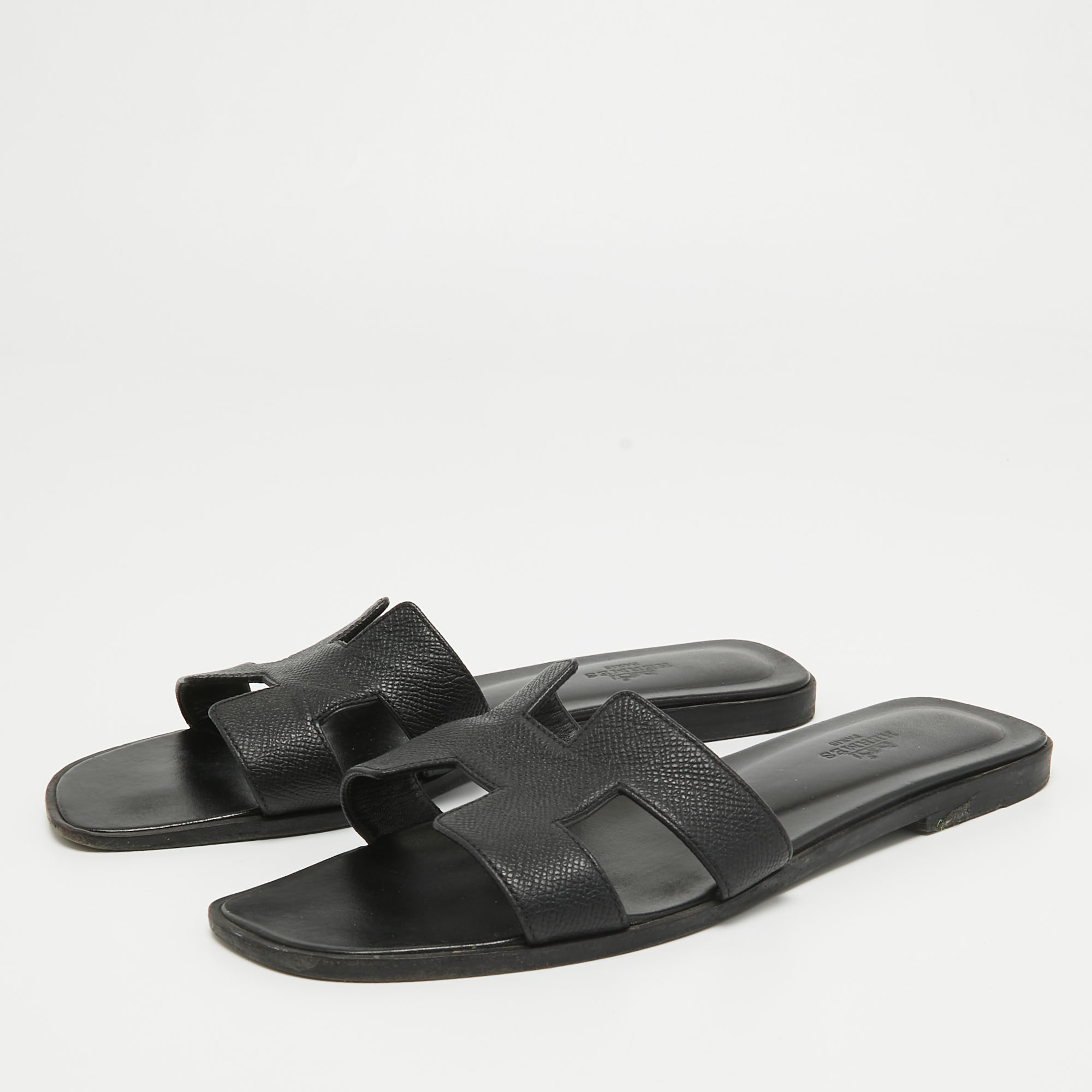 

Hermes Black Leather Oran Flat Slides Size