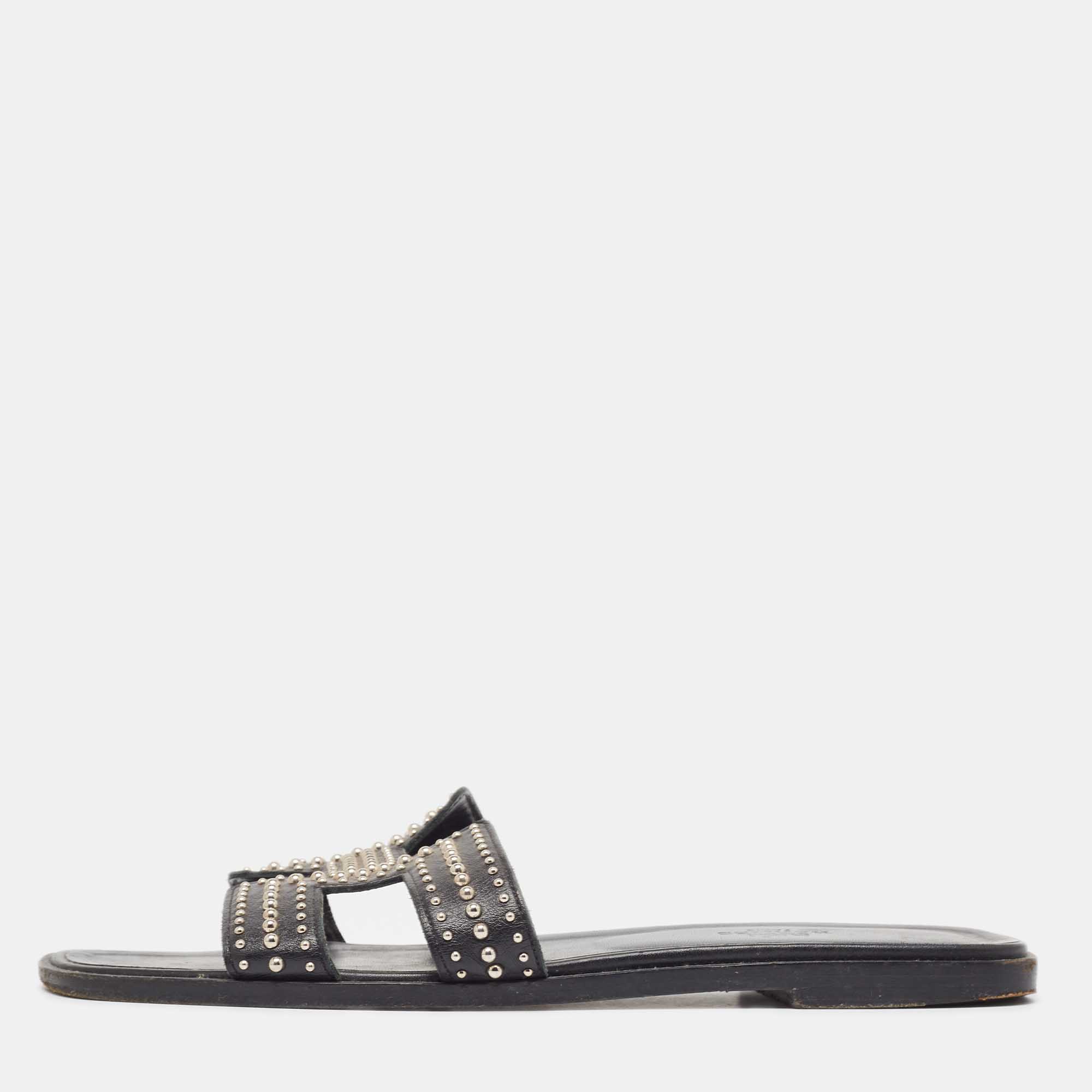 

Hermes Black Studded Leather Oran Flat Slides Size