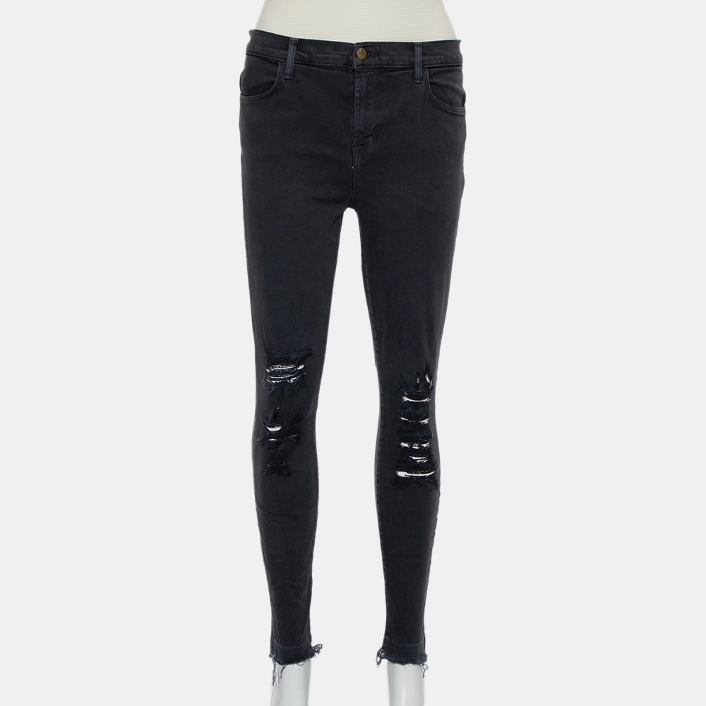 This pair of J Brand Alana jeans offer a stylish look and a good fit Made from a cotton blend these denim jeans come in a black shade and detailed with a distressed finish. Wear them with a leather jacket for a chic appeal.