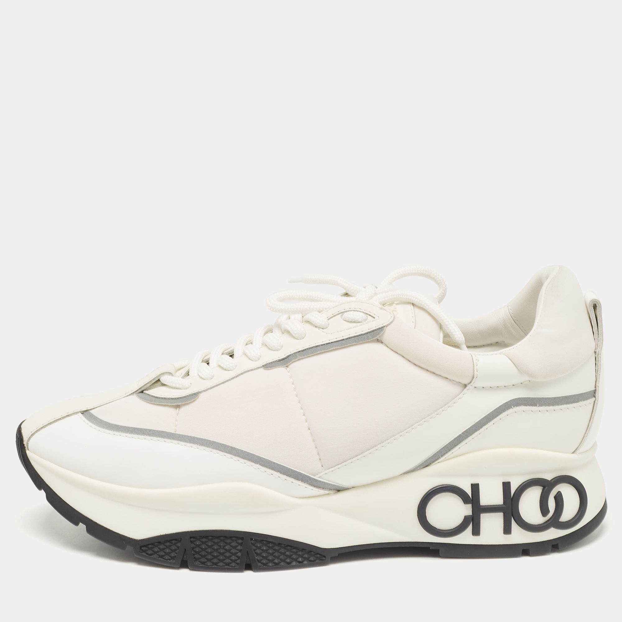 Elevate your footwear game with these Jimmy Choo sneakers. Combining high end aesthetics and unmatched comfort these sneakers are a symbol of modern luxury and impeccable taste.