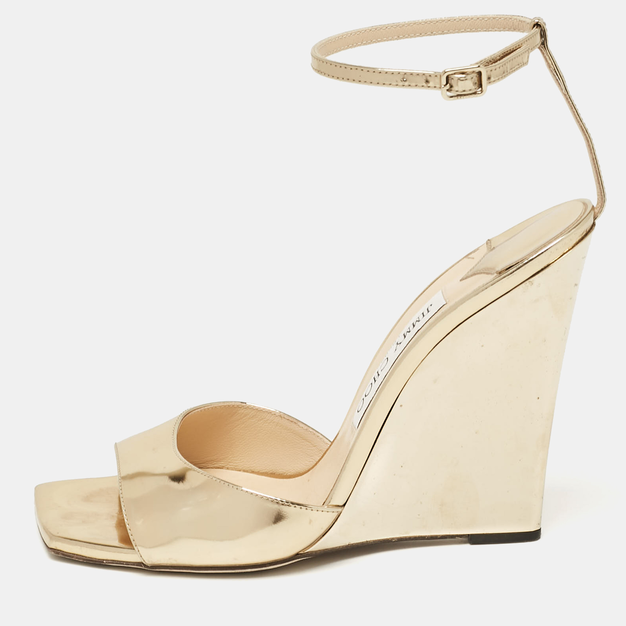 

Jimmy Choo Gold Leather Wedge Sandals Size