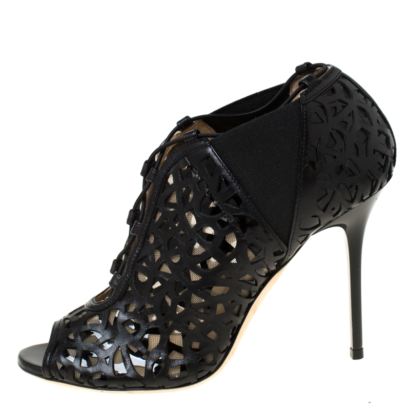 

Jimmy Choo Black Leather Tactic Laser Cut Booties Size