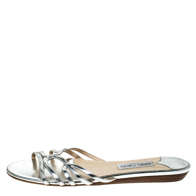 

Jimmy Choo Metallic Silver Leather Cut Out Flat Slides