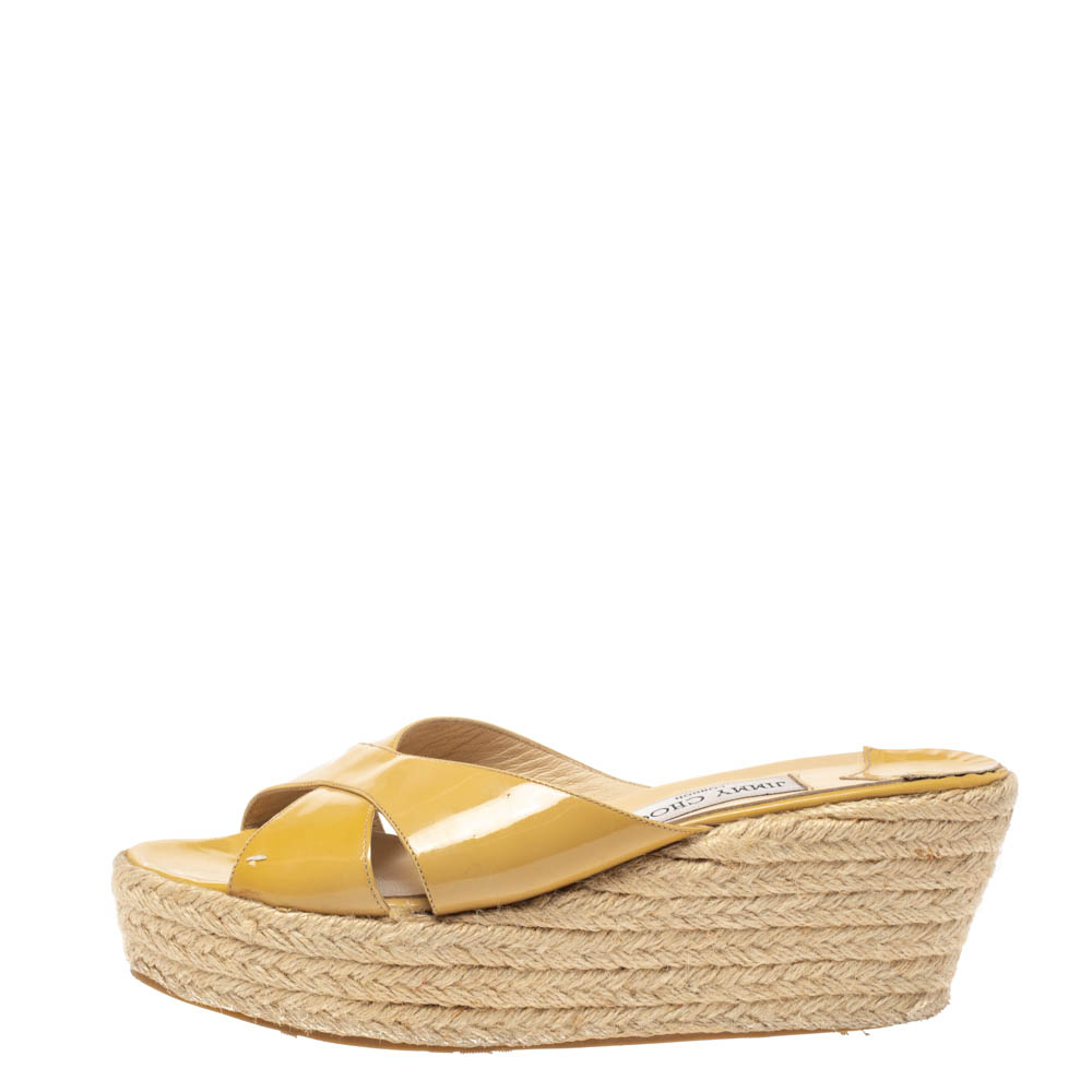 

Jimmy Choo Beige Leather Criss Cross Wedge Sandals Size