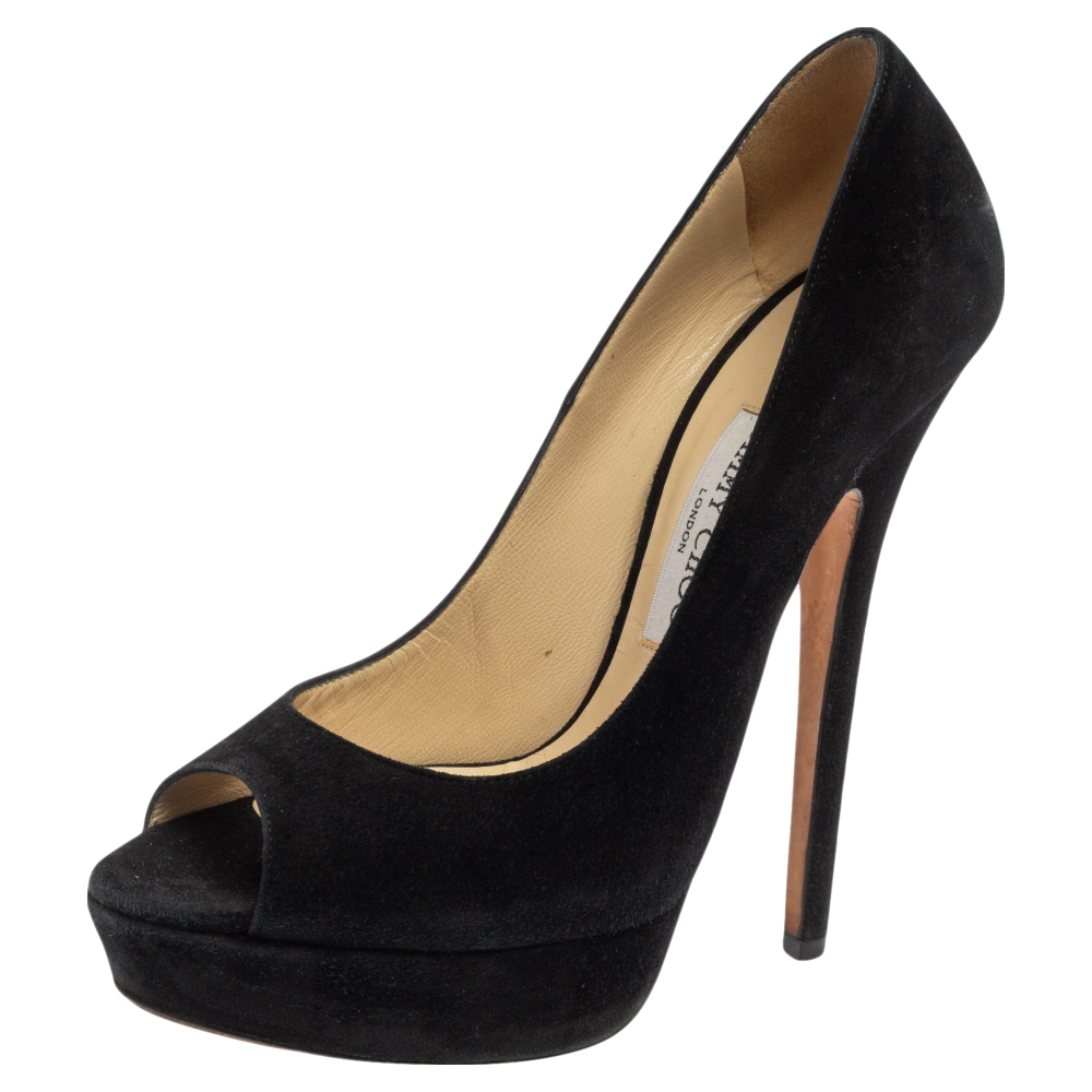 It is easy to fall in love with these pumps by Jimmy Choo Theyve been beautifully crafted from black suede and designed with peep toes platforms and 15 cm heels. The pumps are sure to complement all your dresses and evening gowns.
