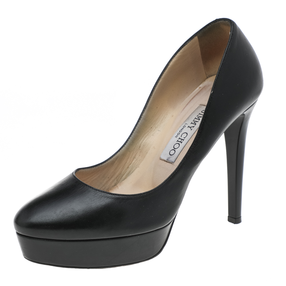 These Alex pumps from the House of Jimmy Choo are truly the best buy They are crafted using black leather and feature rounded toes a slip on style and platforms. They display towering 11.5 cm heels. These pumps will revamp your style in seconds.