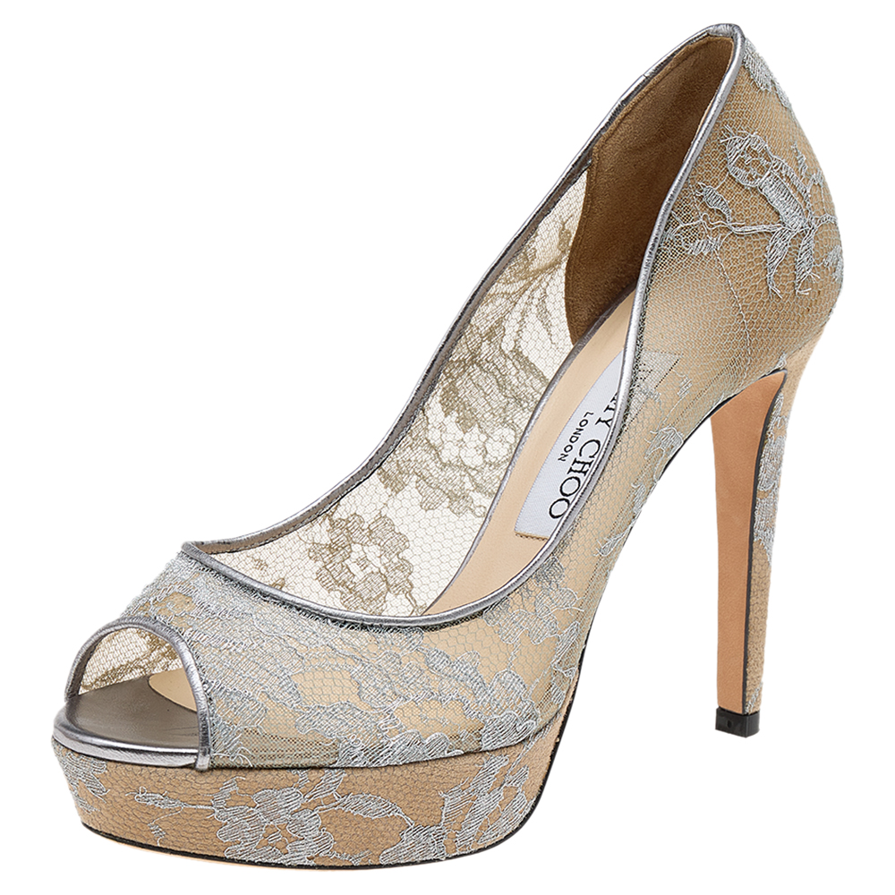 It is easy to fall in love with these pumps by Jimmy Choo Theyve been beautifully crafted from silver lace and designed with peep toes platforms and 11 cm heels. The pumps are sure to complement all your dresses and evening gowns.
