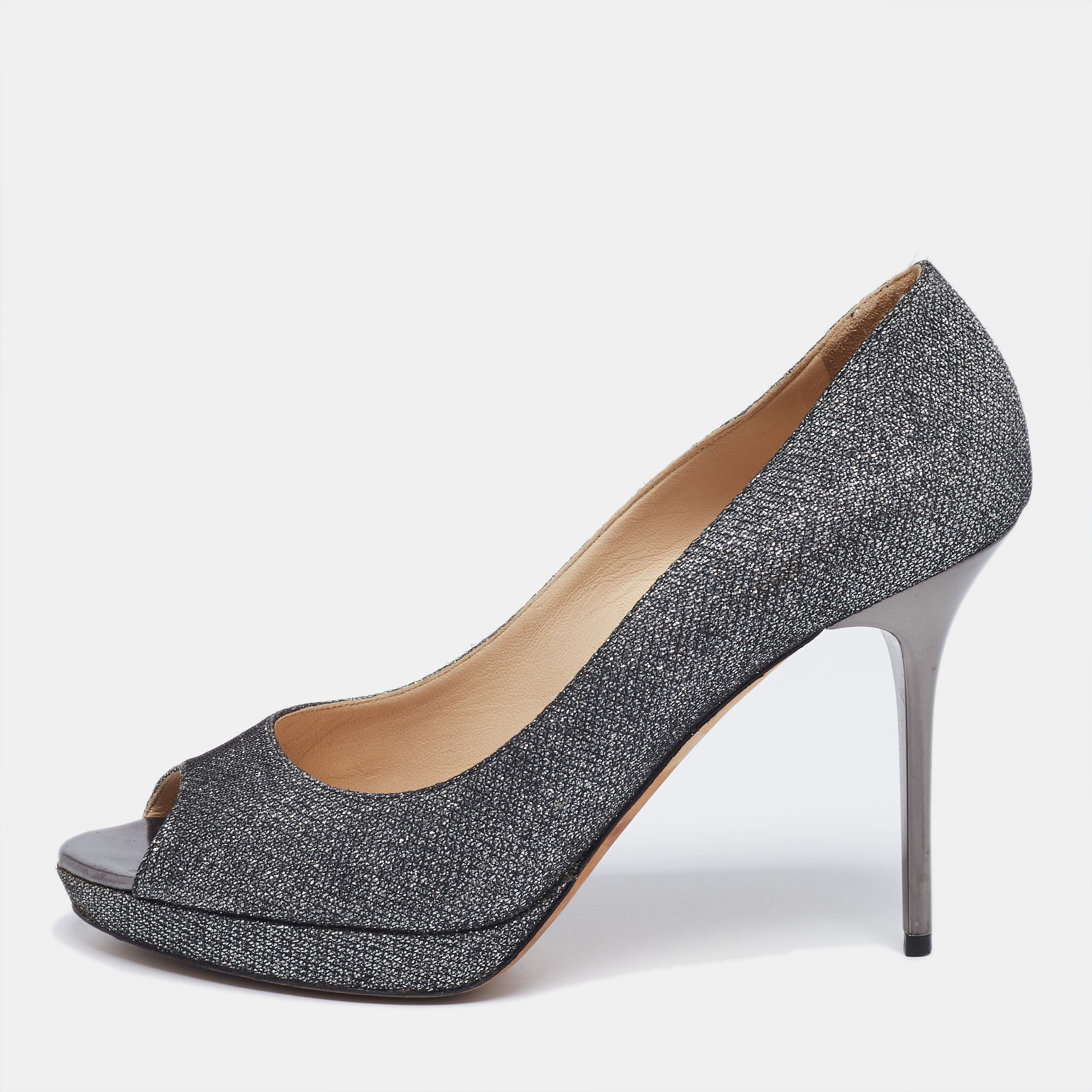 It is easy to fall in love with these pumps by Jimmy Choo Theyve been beautifully crafted from silver glitter and designed with peep toes platforms and 11 cm heels. The pumps are sure to complement all your dresses and evening gowns.