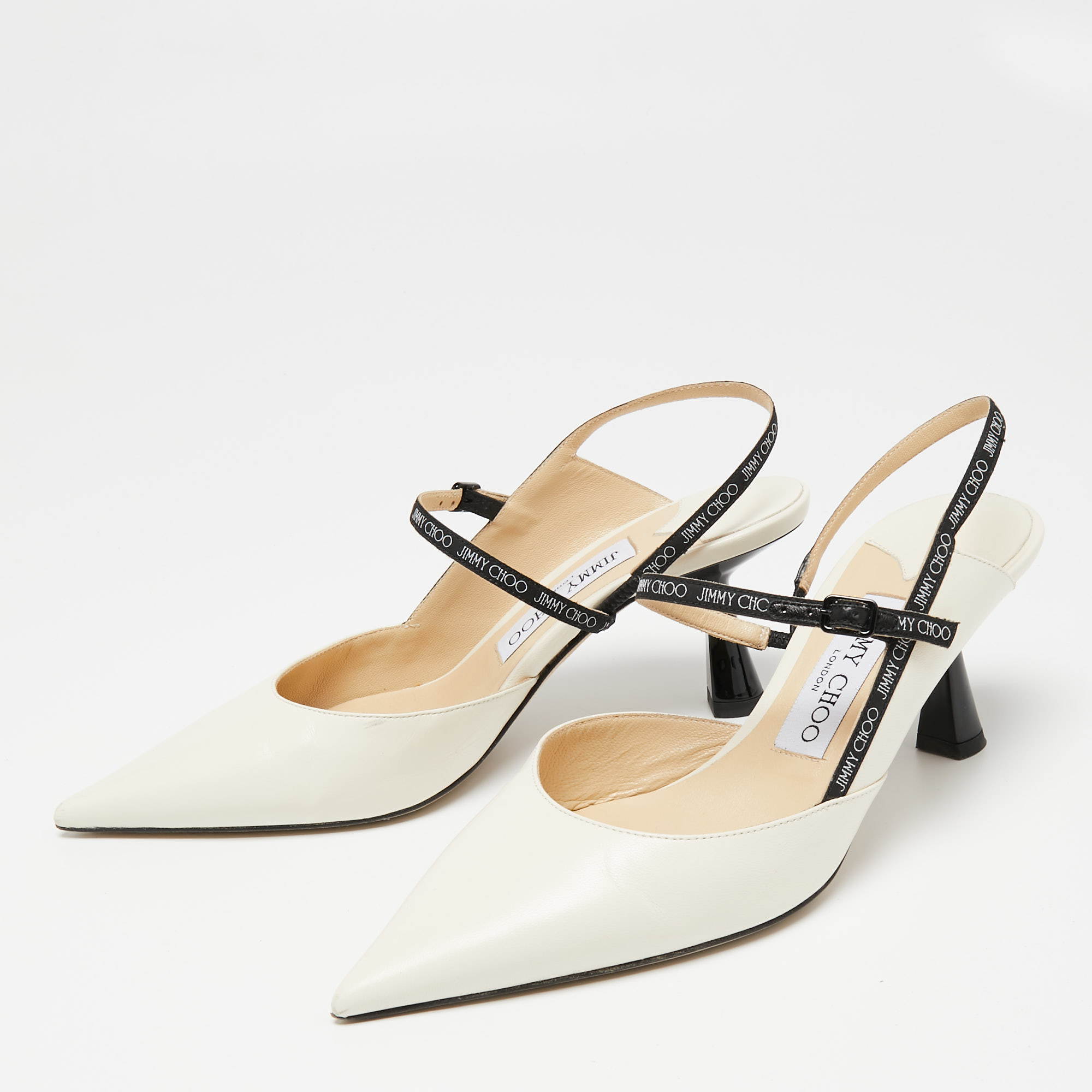 

Jimmy Choo Cream Leather Slingback Sandals Size