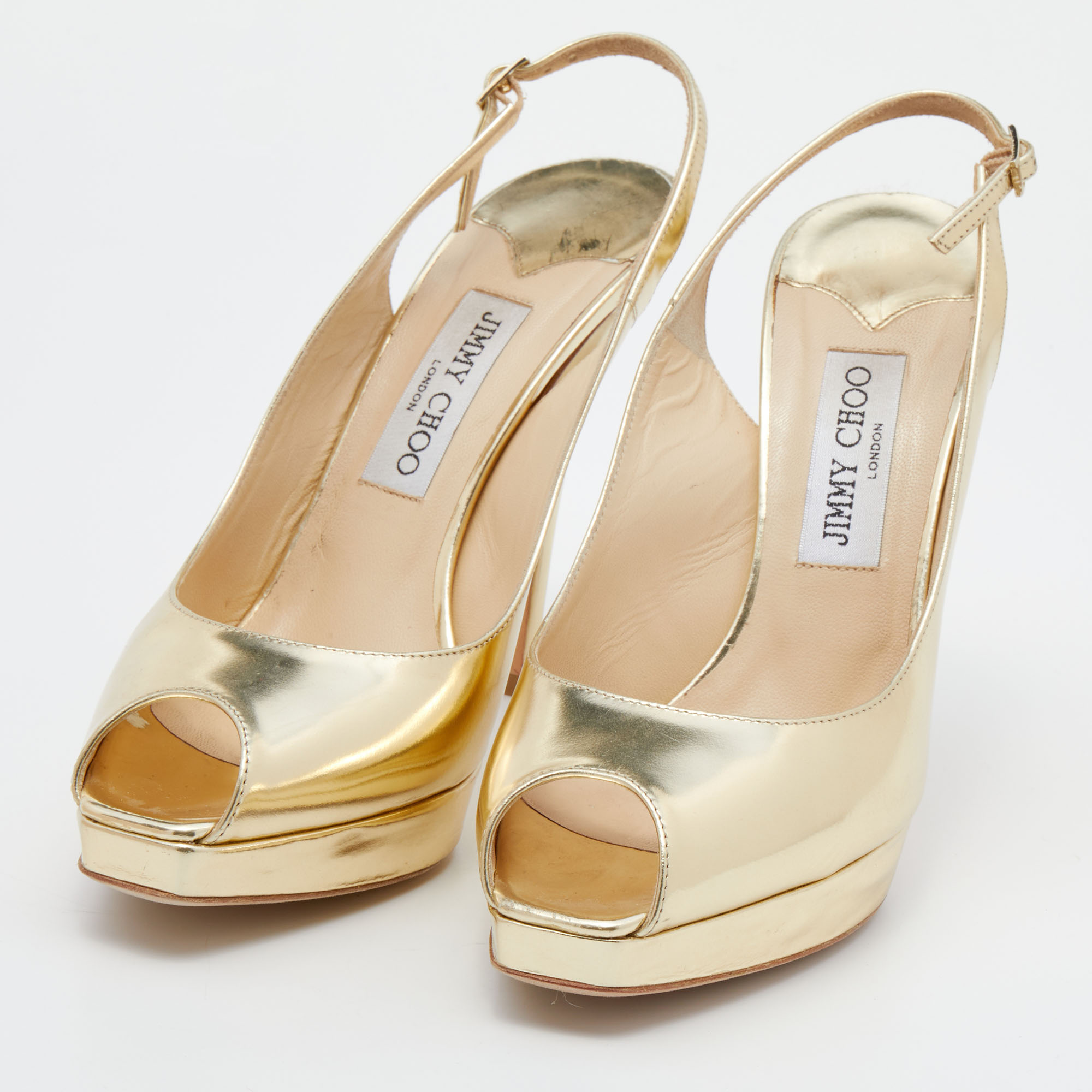 

Jimmy Choo Gold Metallic Leather Clue Platform Slingback Sandals Size