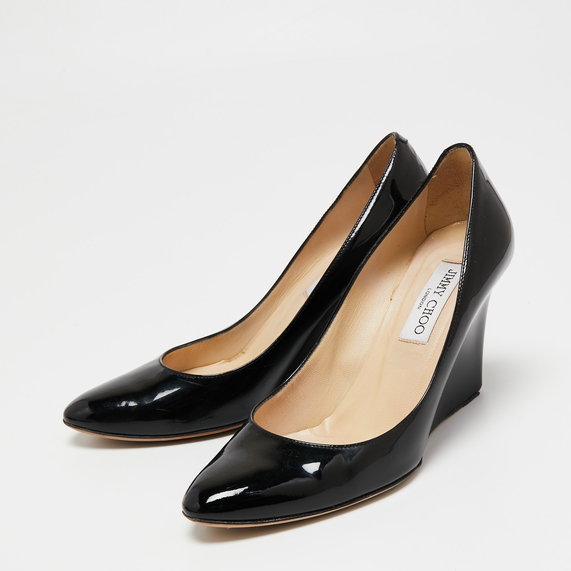 

Jimmy Choo Black Patent Leather Wedge Pumps Size