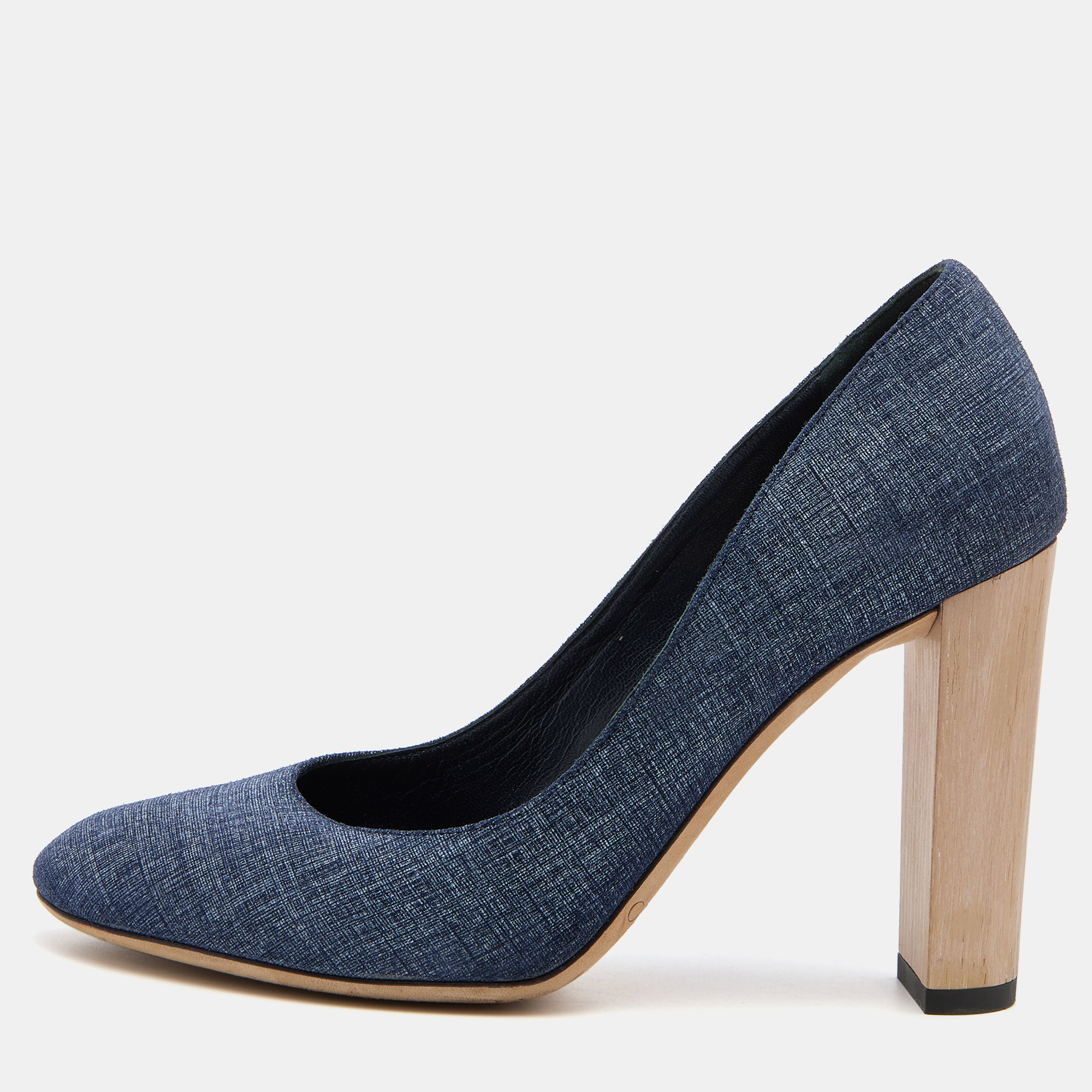 Exhibit an elegant style with this pair of pumps. These designer pumps are crafted from quality materials. They are set on durable soles and high heels.