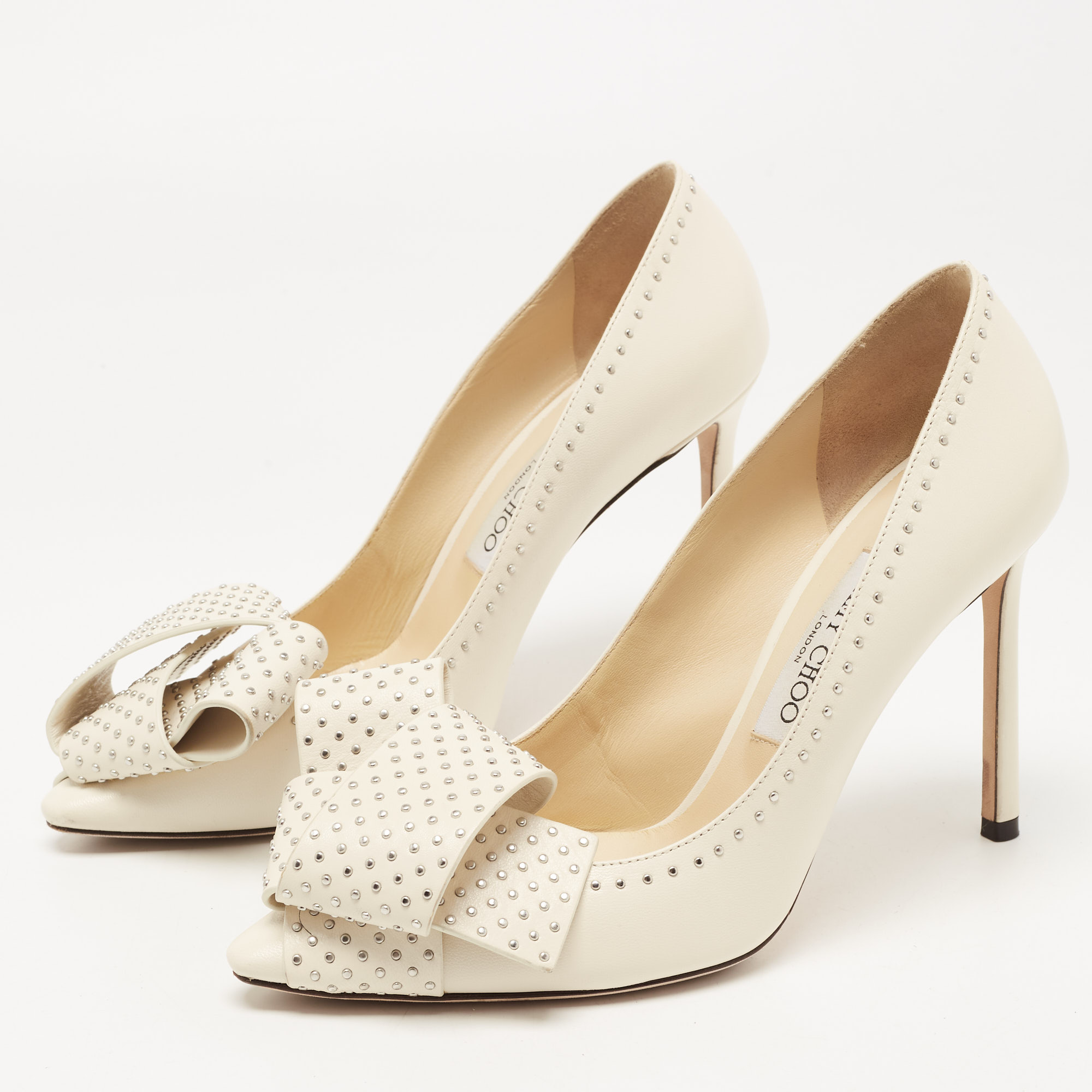 

Jimmy Choo Cream Leather Studded Bow Tegan Pumps Size