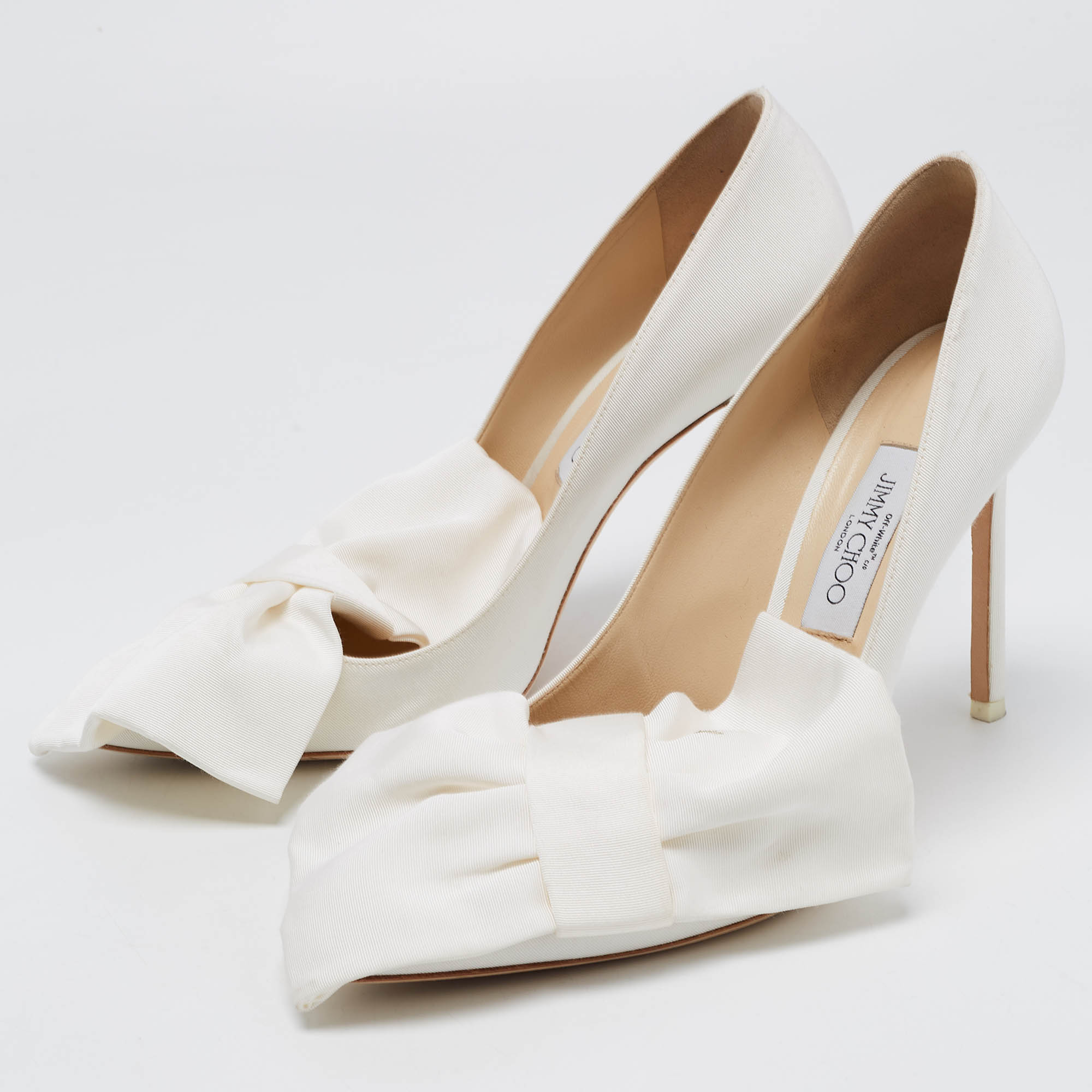 

Jimmy Choo White Canvas Oversized Bow Pumps Size