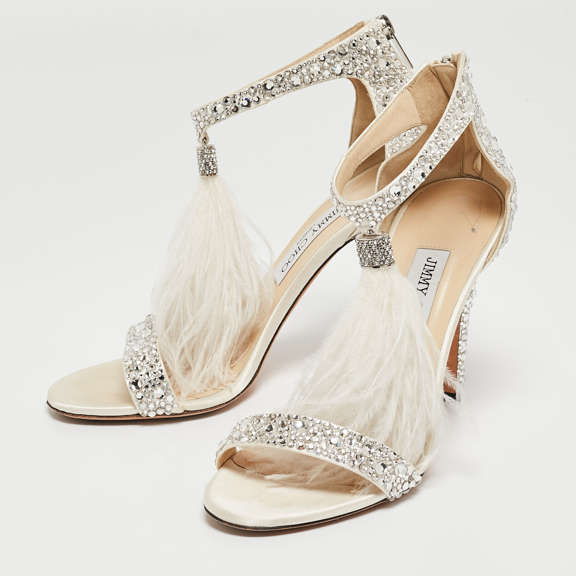 

Jimmy Choo Off White Crystal Embellished Satin and Feather Viola Sandals Size