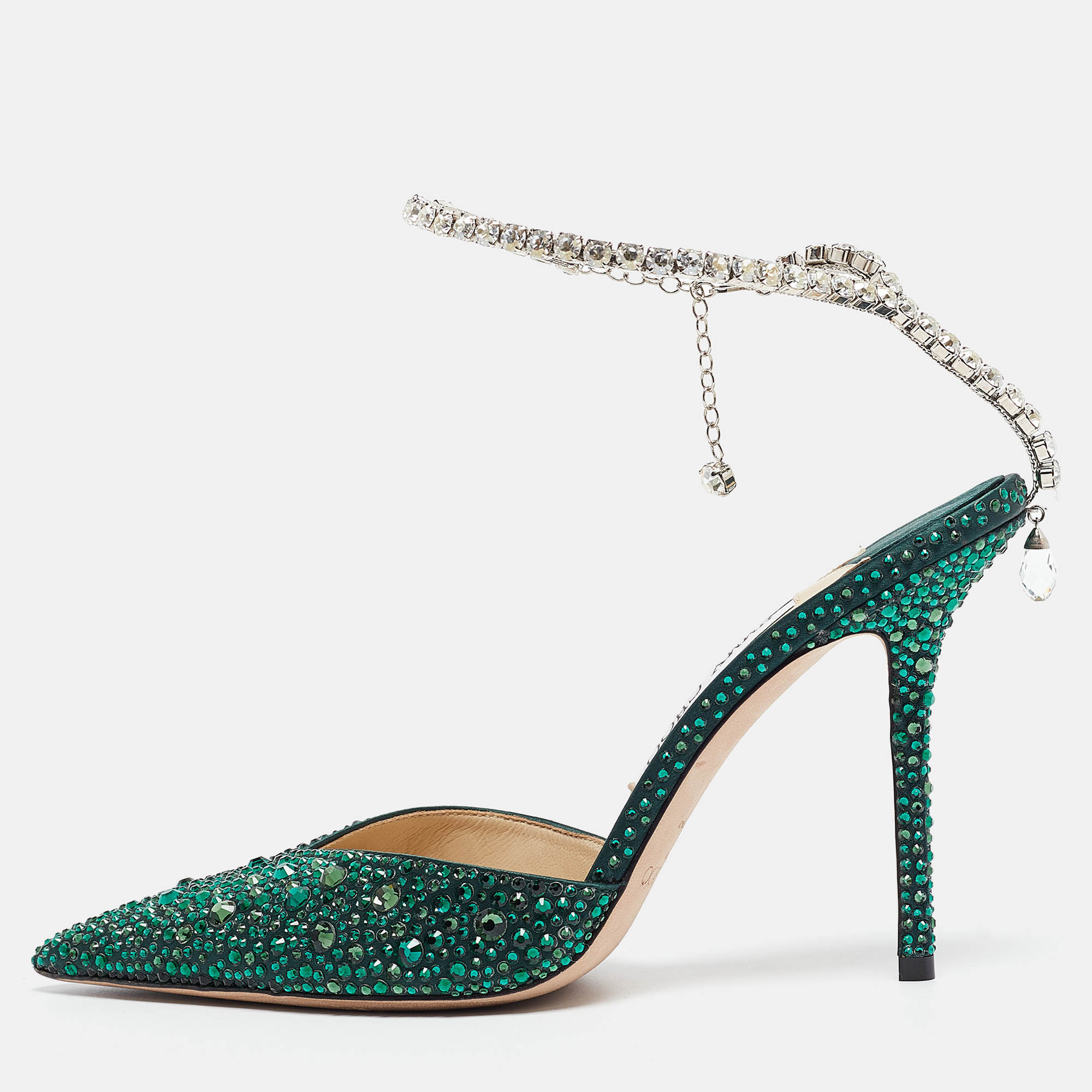 The crystal embellished ankle strap of this pair of Jimmy Choo pumps will elegantly hug your feet. Created from satin it is sculpted to form a pointed toe silhouette in an attractive green shade. The 11.5cm heels of these shoes will add grace to your every step.