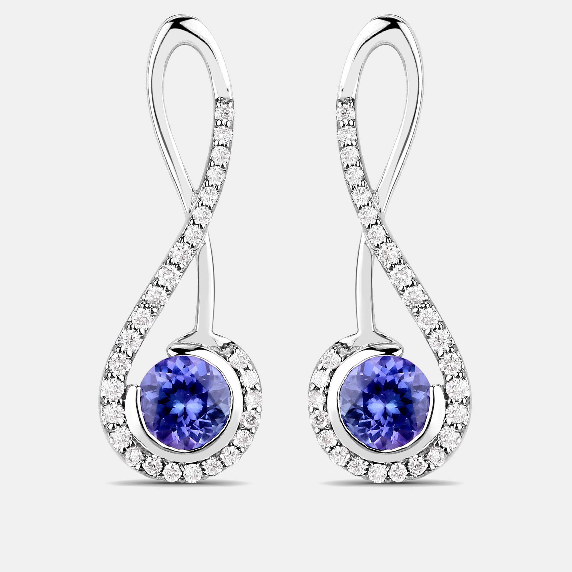 Click to view more detailed imagery on our partner's website Pre-owned Keesh Jewels 1.06 Cts Tanzanite And Diamond 14k White Gold Infinity Earrings