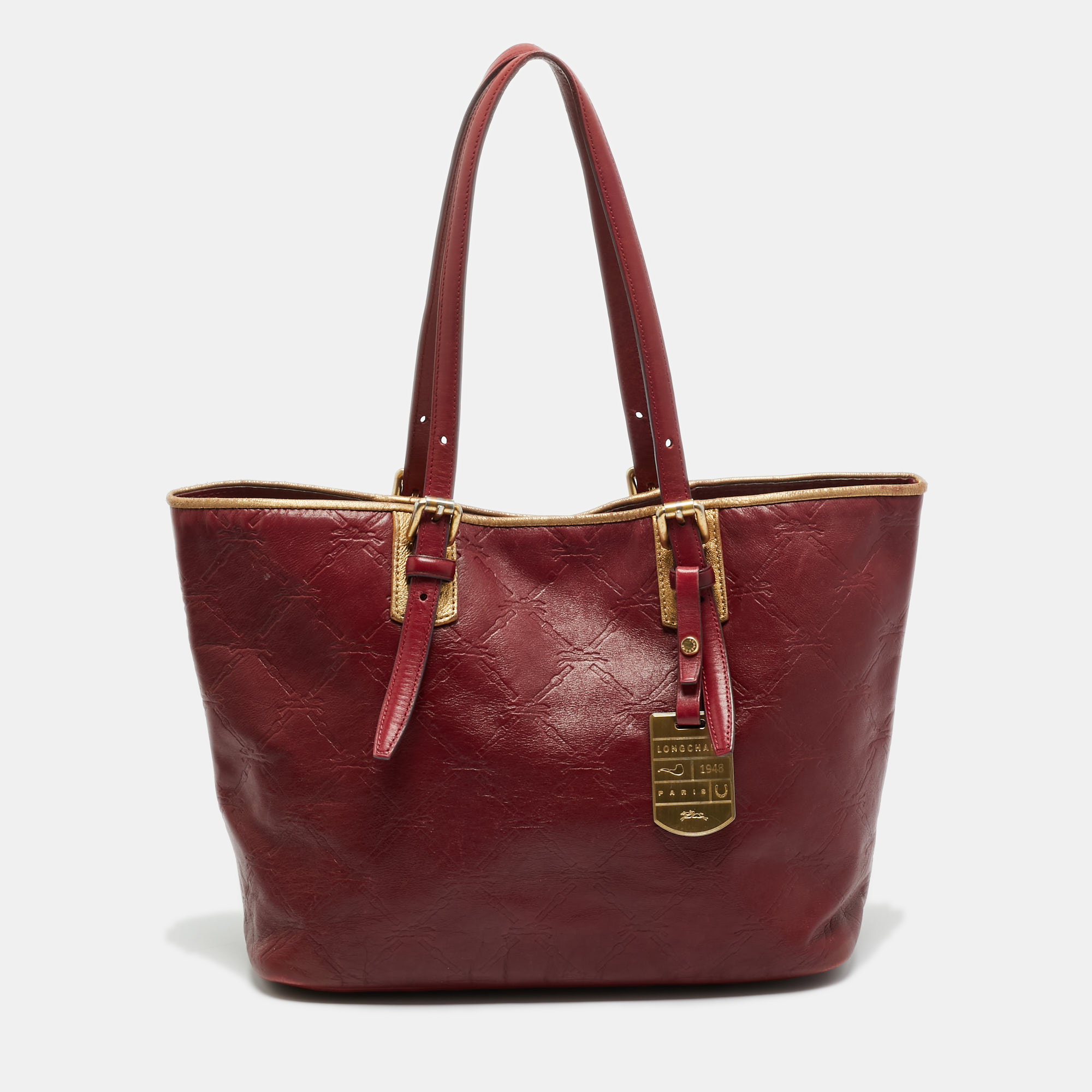 

Longchamp LM Cuir Burgundy/Gold Logo Embossed Leather Tote