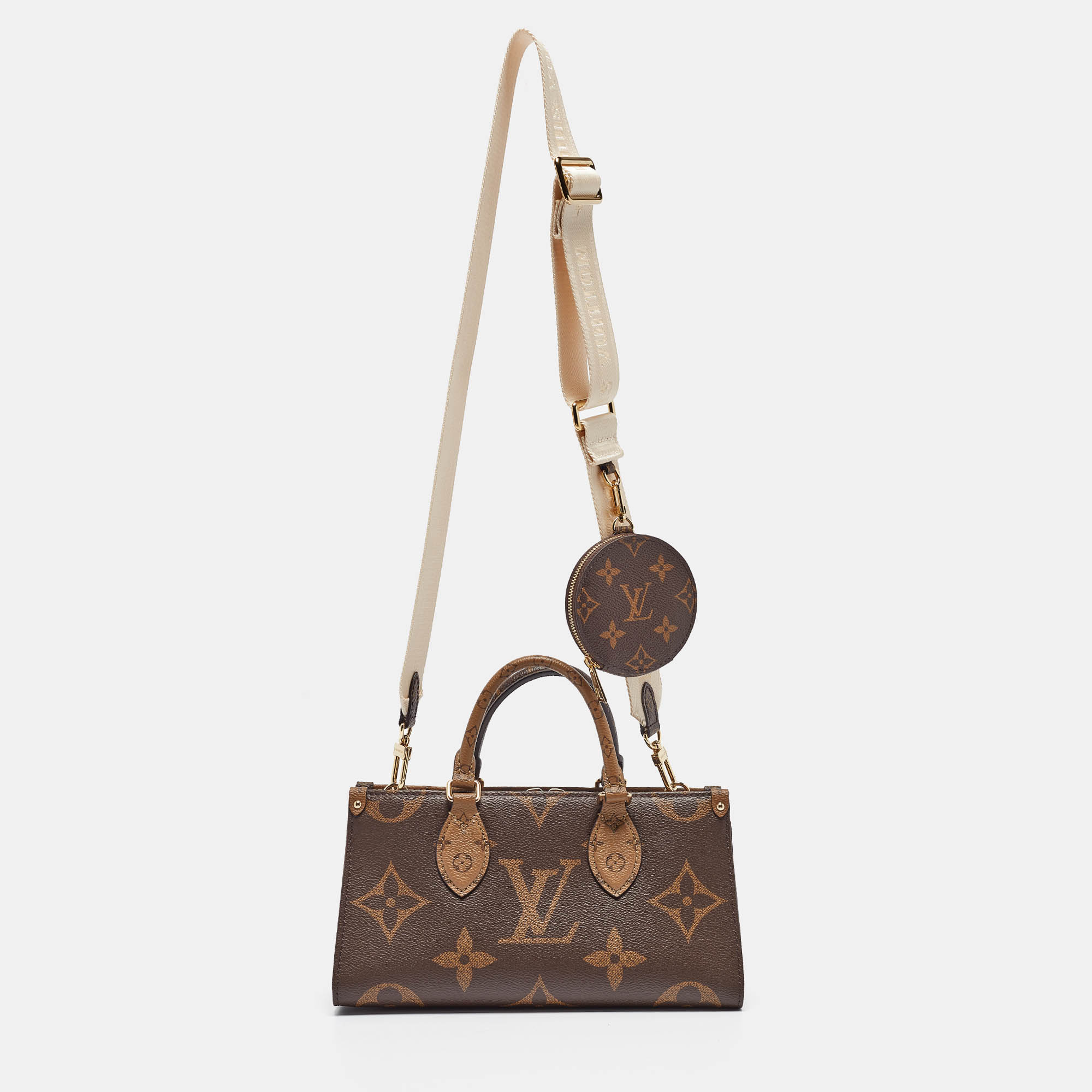 

Louis Vuitton Monogram Reverse Giant Canvas Onthego East West Bag, Brown