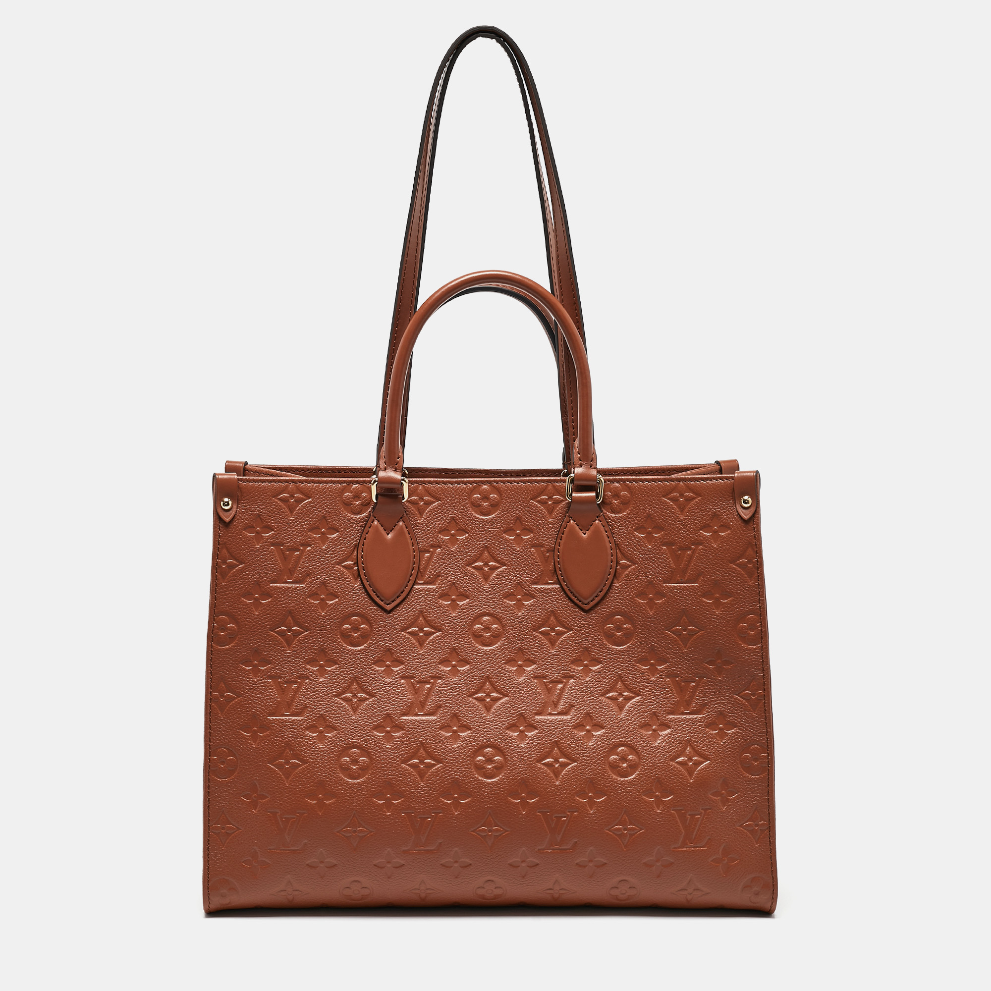 

Louis Vuitton Cognac Monogram Empreinte Leather Onthego MM Bag, Brown