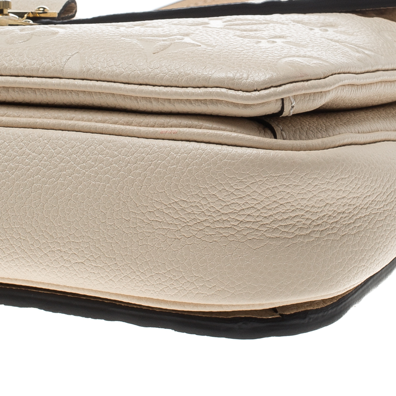 Pochette Métis East West Monogram Empreinte Leather - Handbags