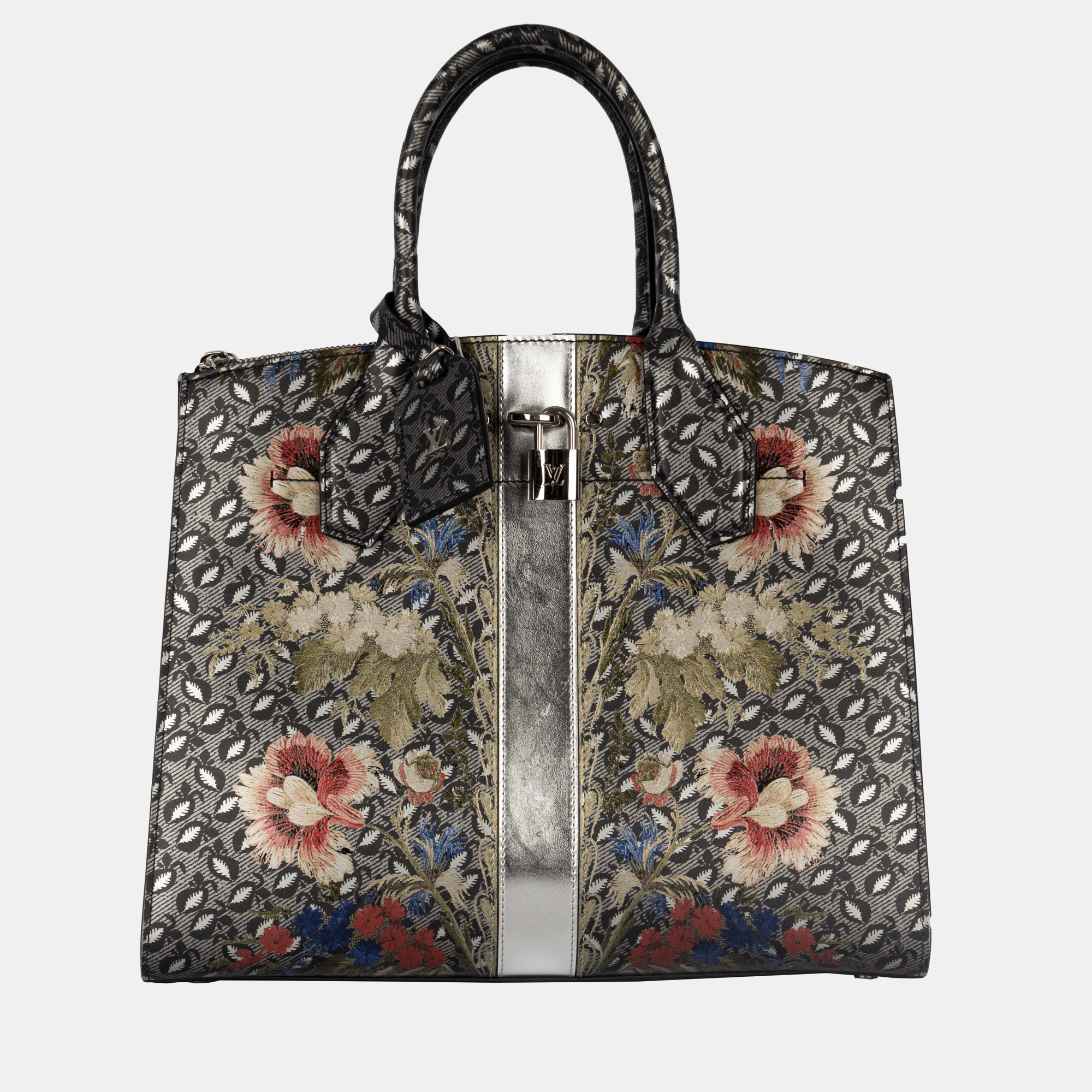 Launched under the S/S 2018 collection this Louis Vuitton Epi Floral City Steamer MM is a vision to behold. With the romantic multicolored floral print accentuated by with silver panel in the center the metallic attachments and hardware are engraved with brand emblems such as the monogram and brand name.