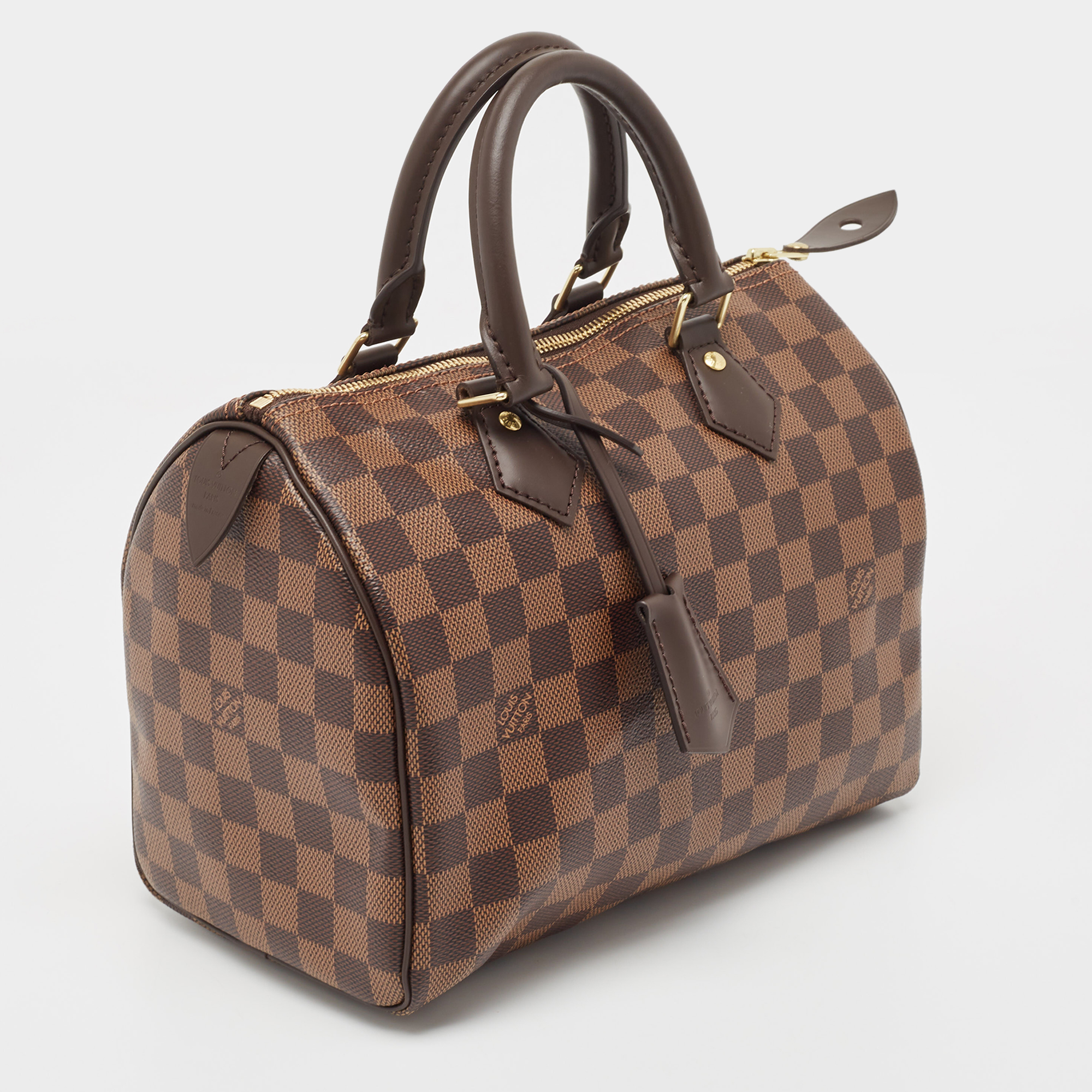 

Louis Vuitton Damier Ebene Canvas Speedy 25 Bag, Brown