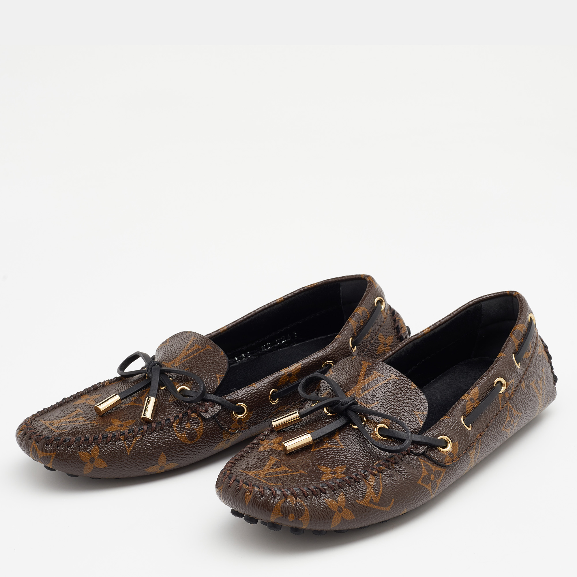 

Louis Vuitton Brown Monogram Canvas Gloria Bow Slip On Loafers Size