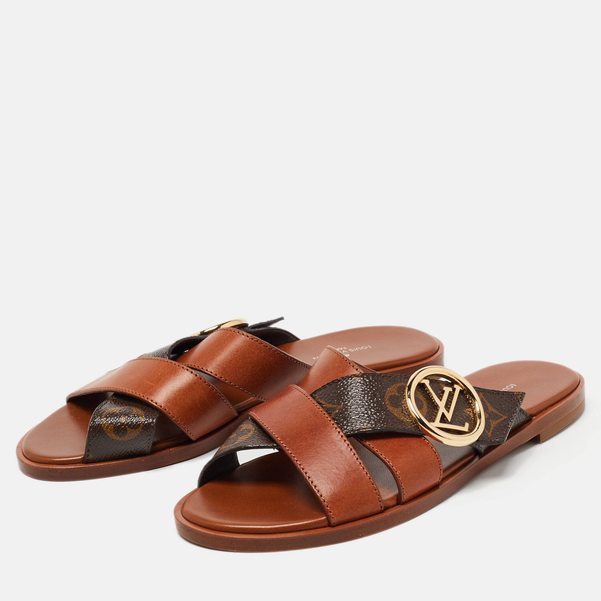 

Louis Vuitton Brown Leather and Monogram Canvas Flat Slides Size