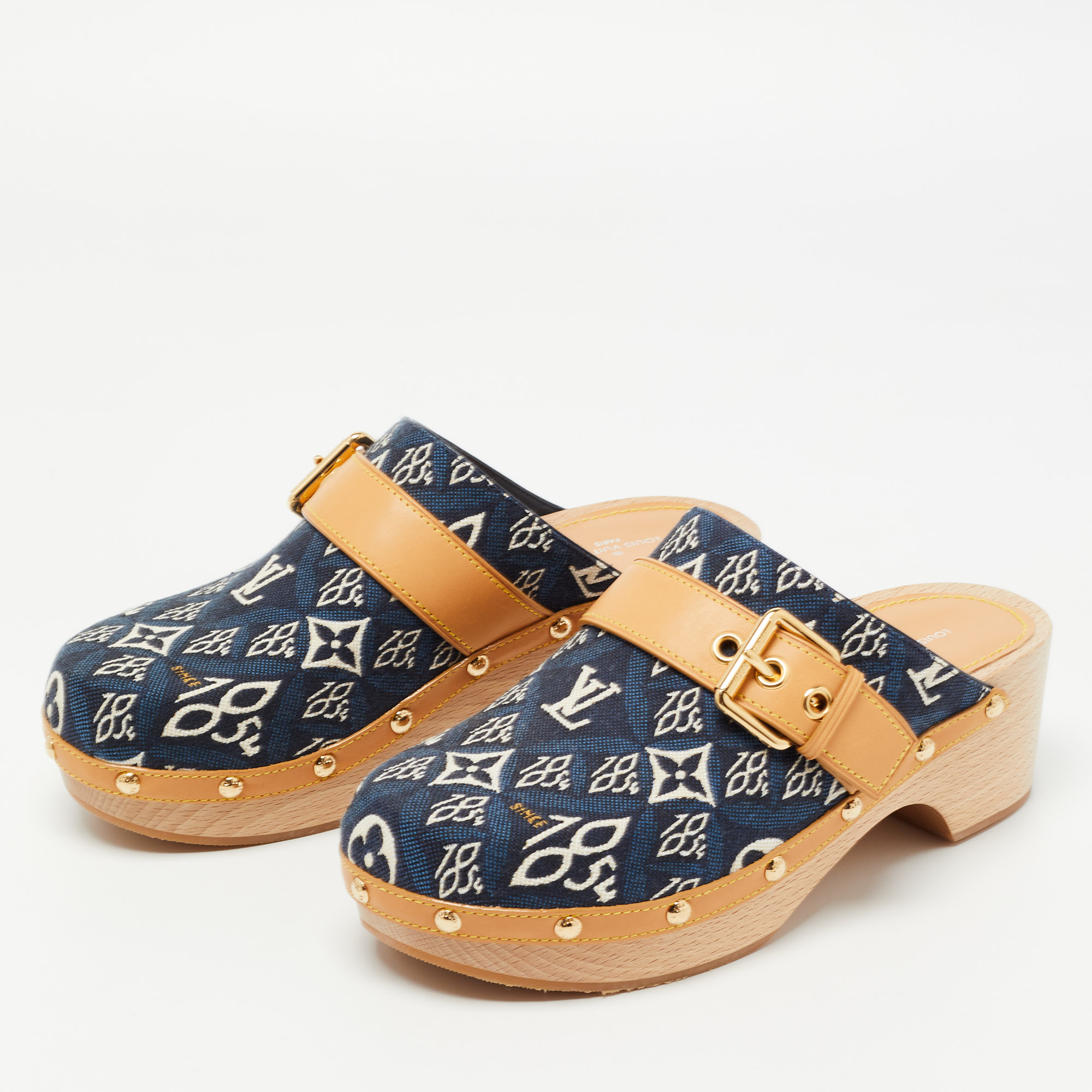 

Louis Vuitton Navy Blue/Tan Printed Canvas and Leather Cottage Clog Mules Size