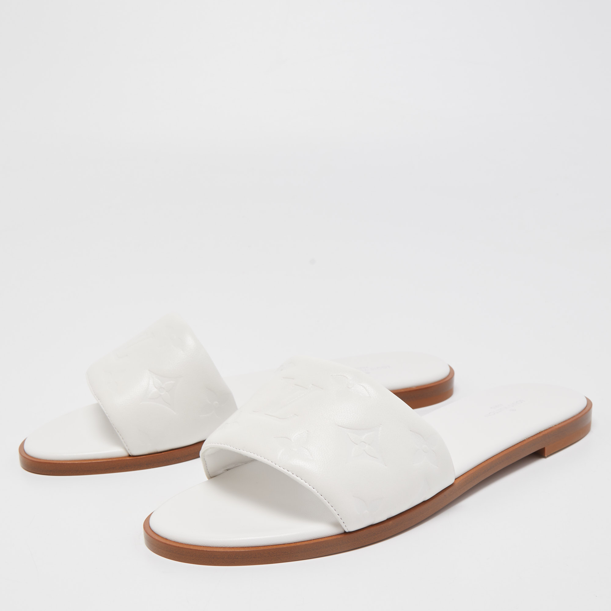 

Louis Vuitton White Leather Revival Slide Fats Size