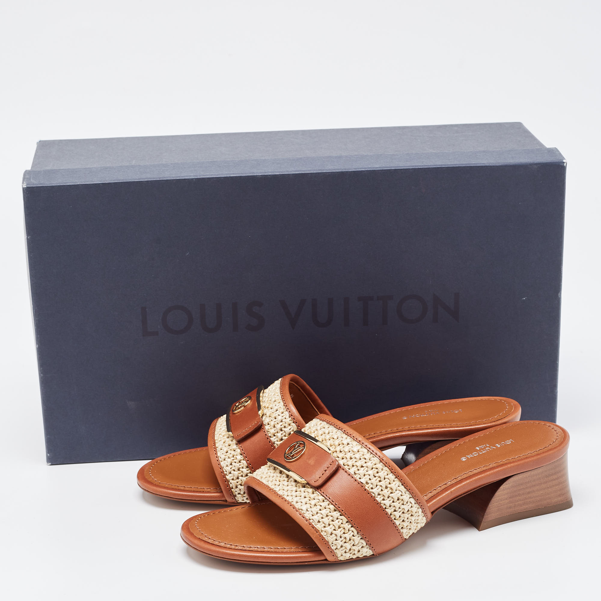 Louis Vuitton Brown Leather Lock It Flat Mules Size 37