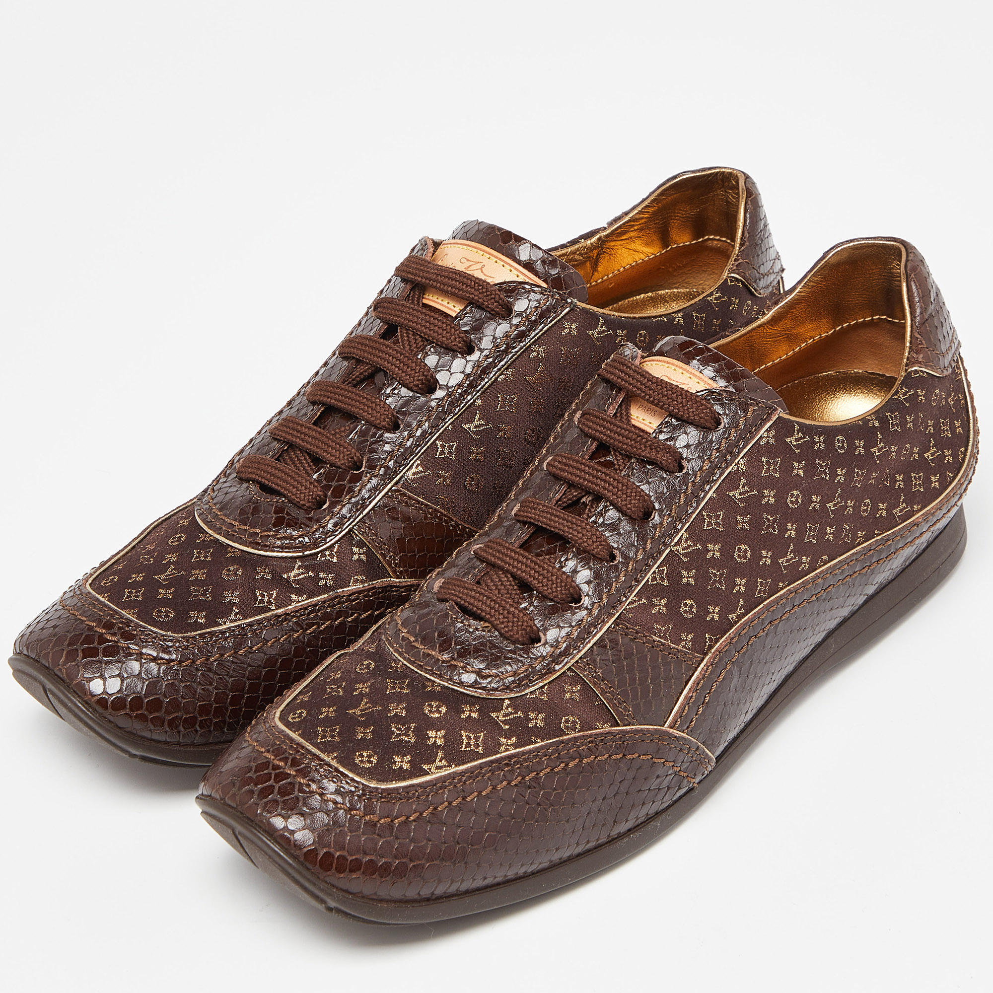 

Louis Vuitton Brown Monogram Print Fabric and Embossed Snakeskin Low Top Sneakers Size