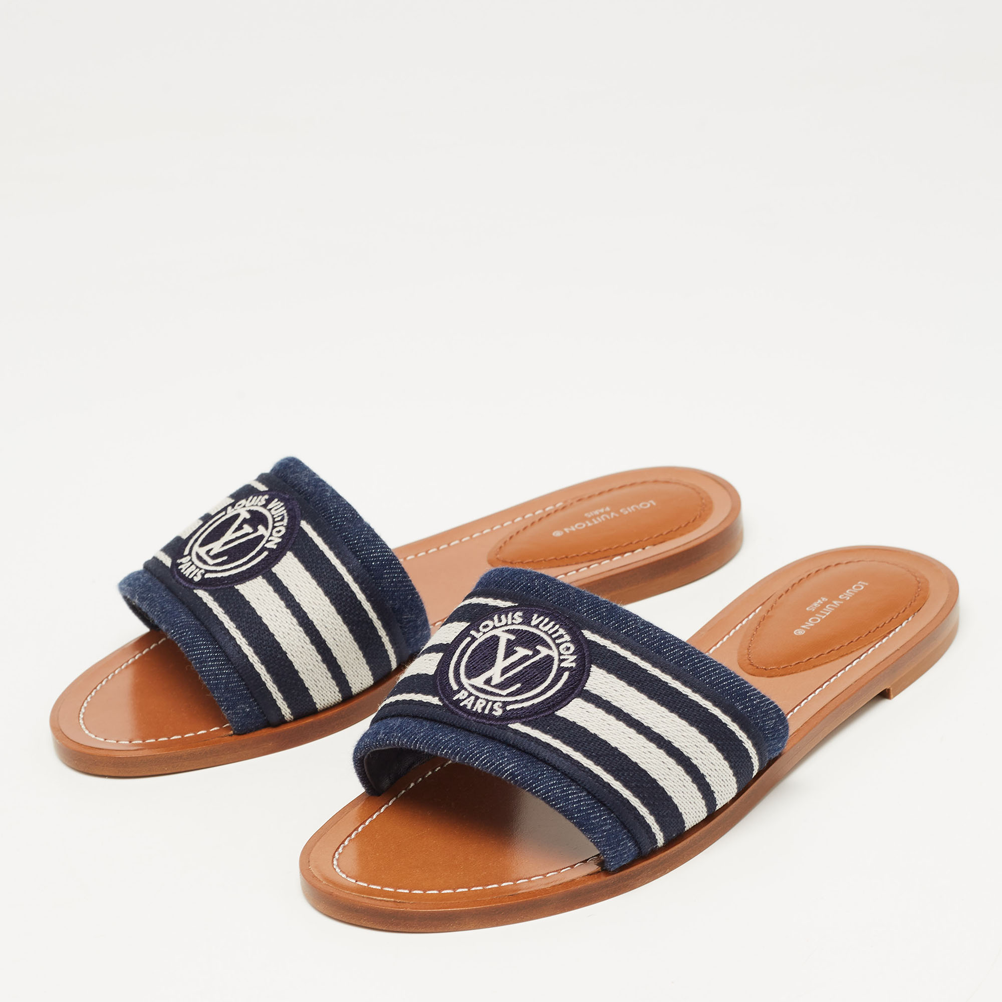 

Louis Vuitton Navy Blue/White Canvas Lock It Flat Slides Size