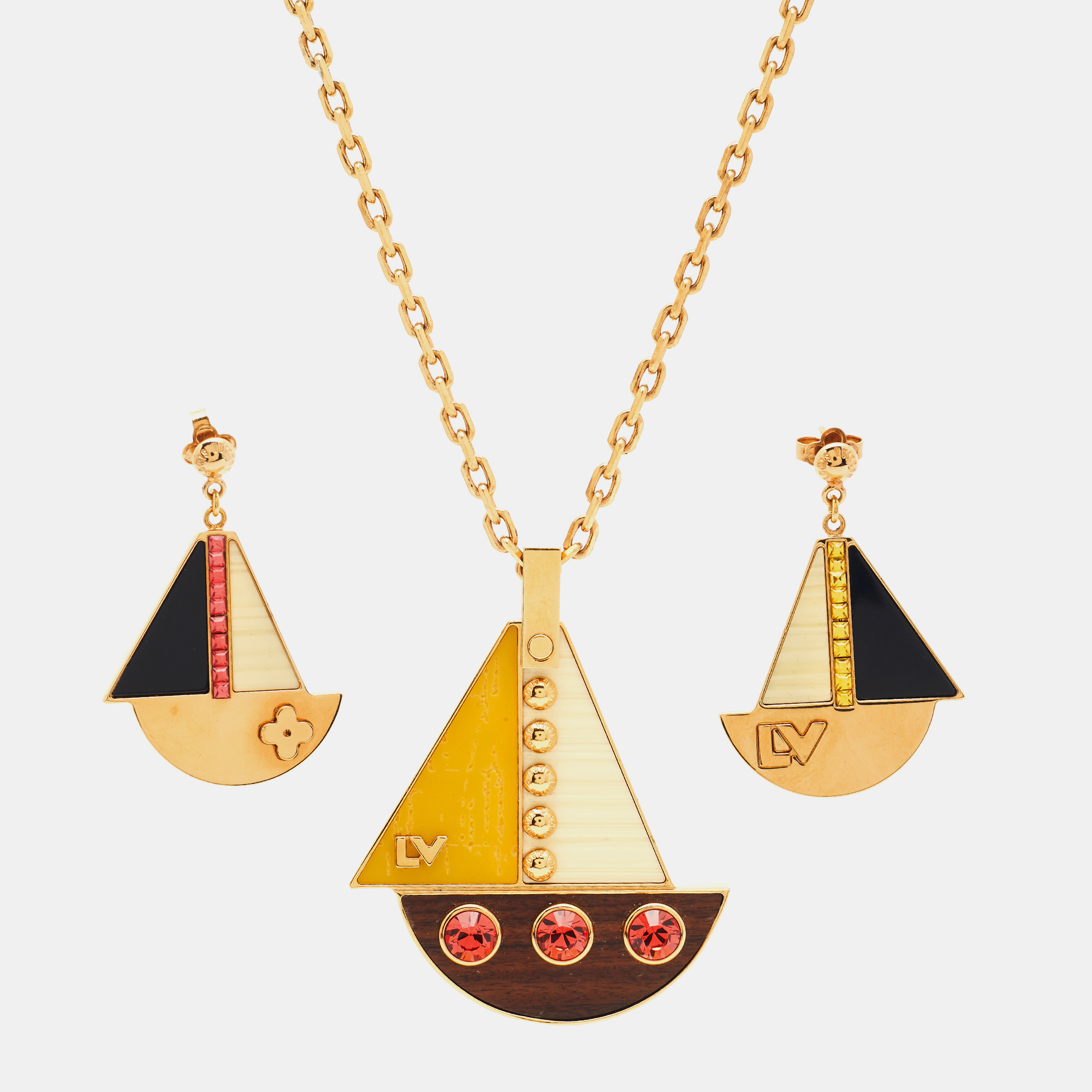 

Louis Vuitton Float the Boat Crystal Resin Wood Gold Tone Necklace and Earrings Set