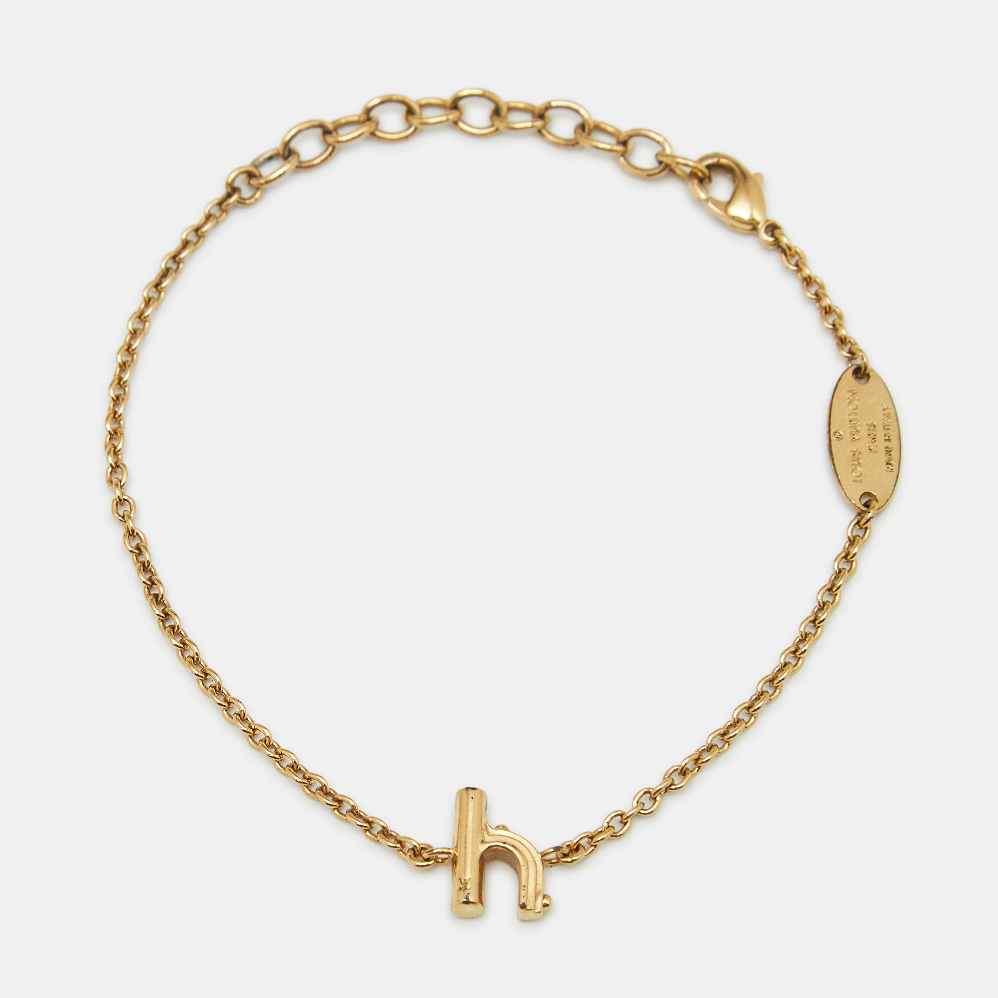 

Louis Vuitton LV & Me Letter H Gold Tone Bracelet