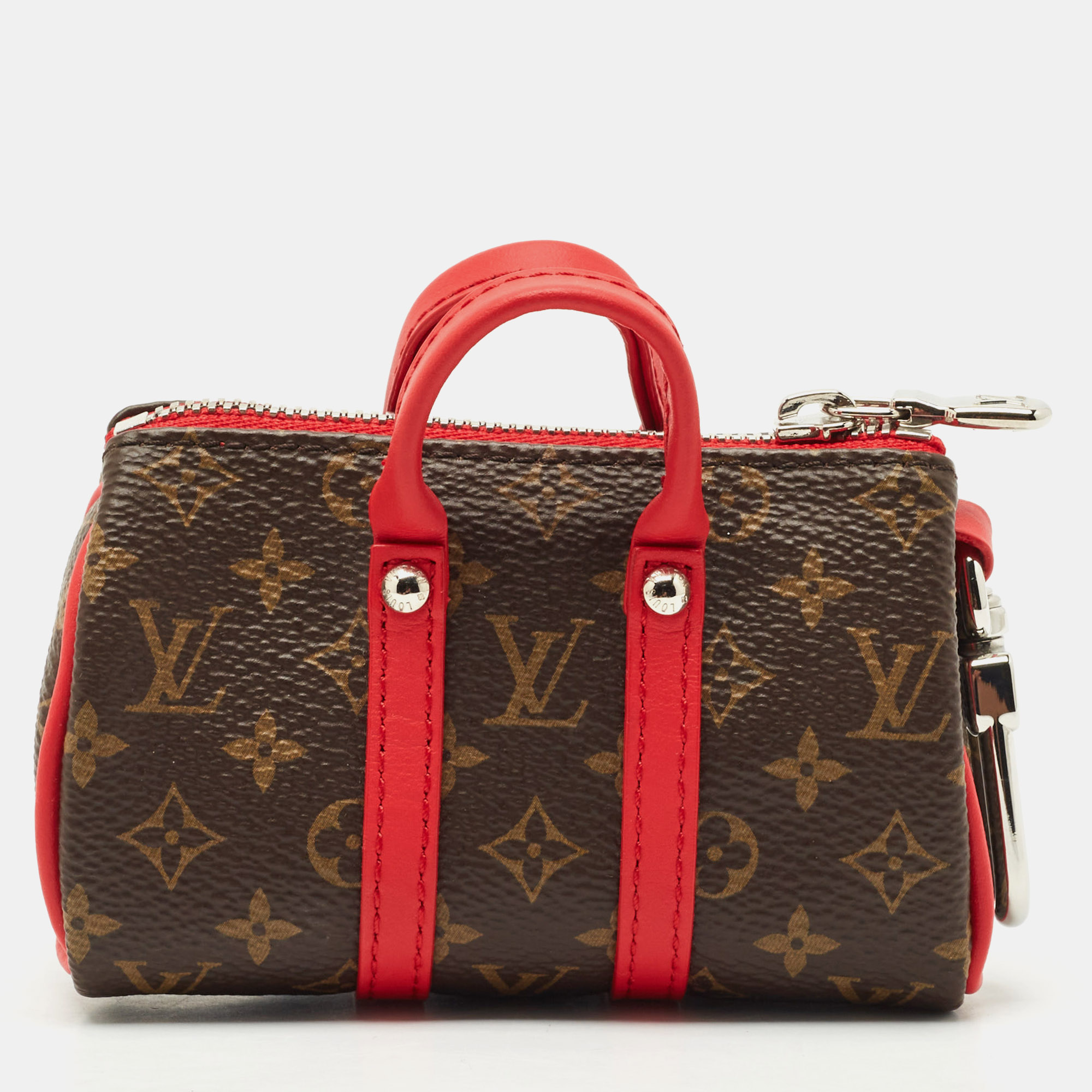 

Louis Vuitton Monogram Canvas LV Colormania Mini Keepall Pouch, Brown