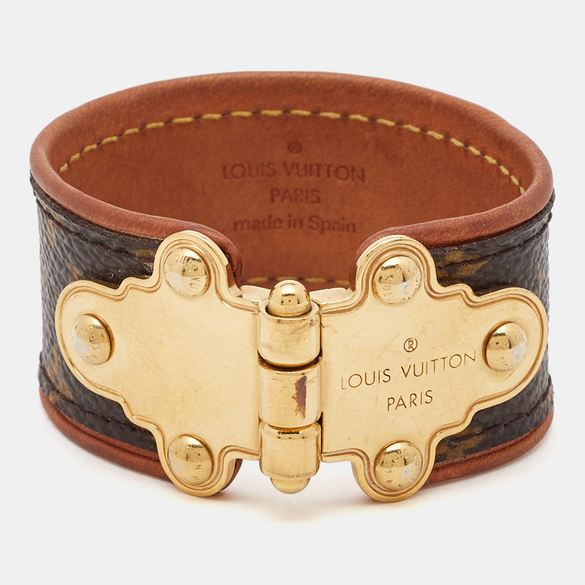 

Louis Vuitton Gold Tone Save It Brown Monogram Canvas Wide Cuff Bracelet