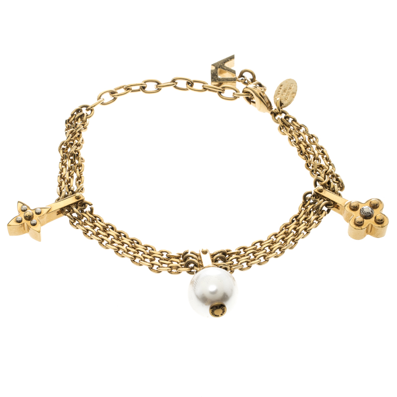 

Louis Vuitton Faux Pearl Gold Tone Charm Bracelet