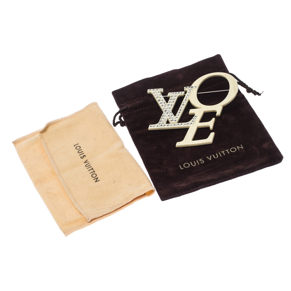 Louis Vuitton Pins & brooches Beige Resin ref.507970 - Joli Closet