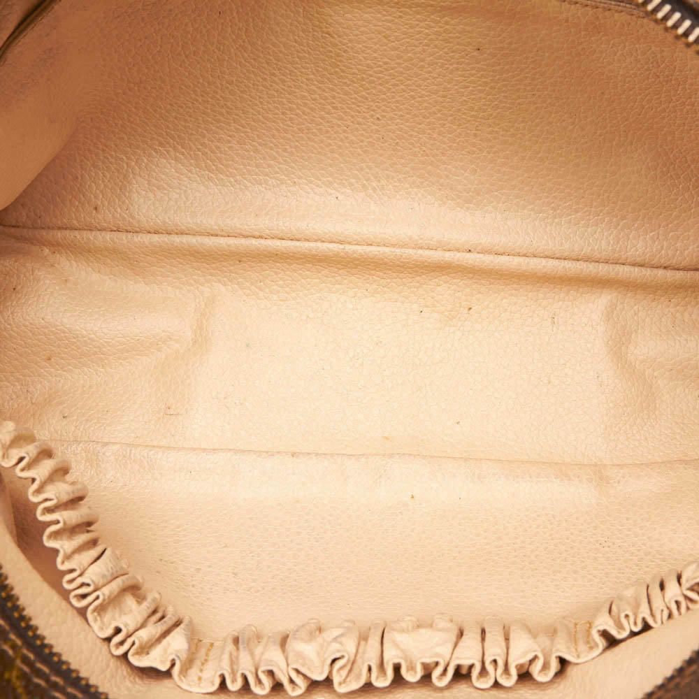 

Louis Vuitton Monogram Canvas Trousse Toilette 28 Pouch, Brown