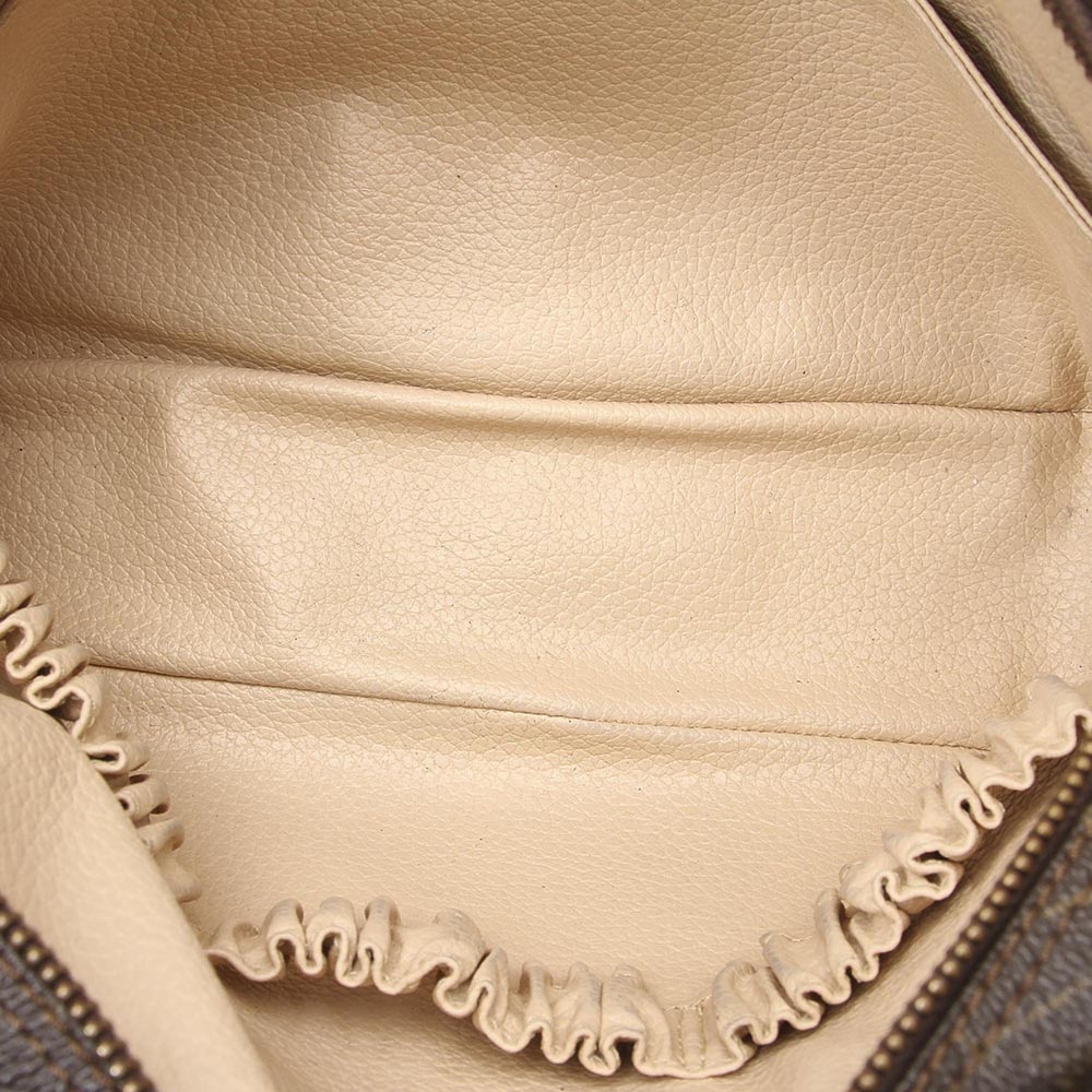 

Louis Vuitton Monogram Canvas Trousse Toilette 23, Brown