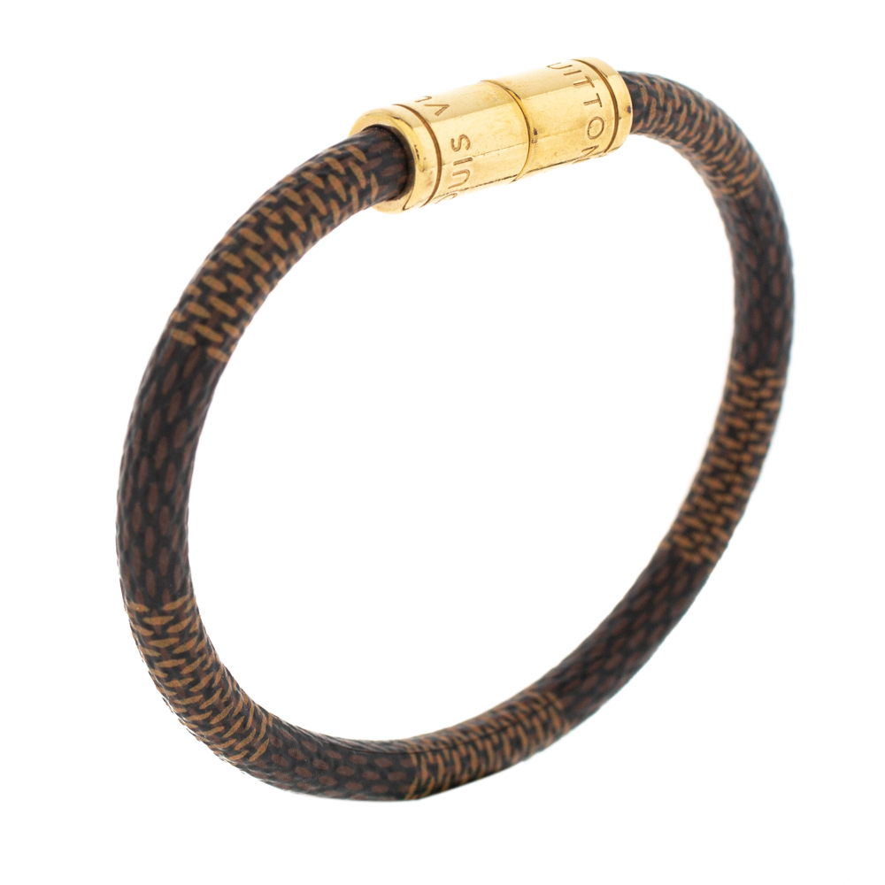 

Louis Vuitton Keep It Damier Ebene Canvas Gold Tone Bracelet, Brown