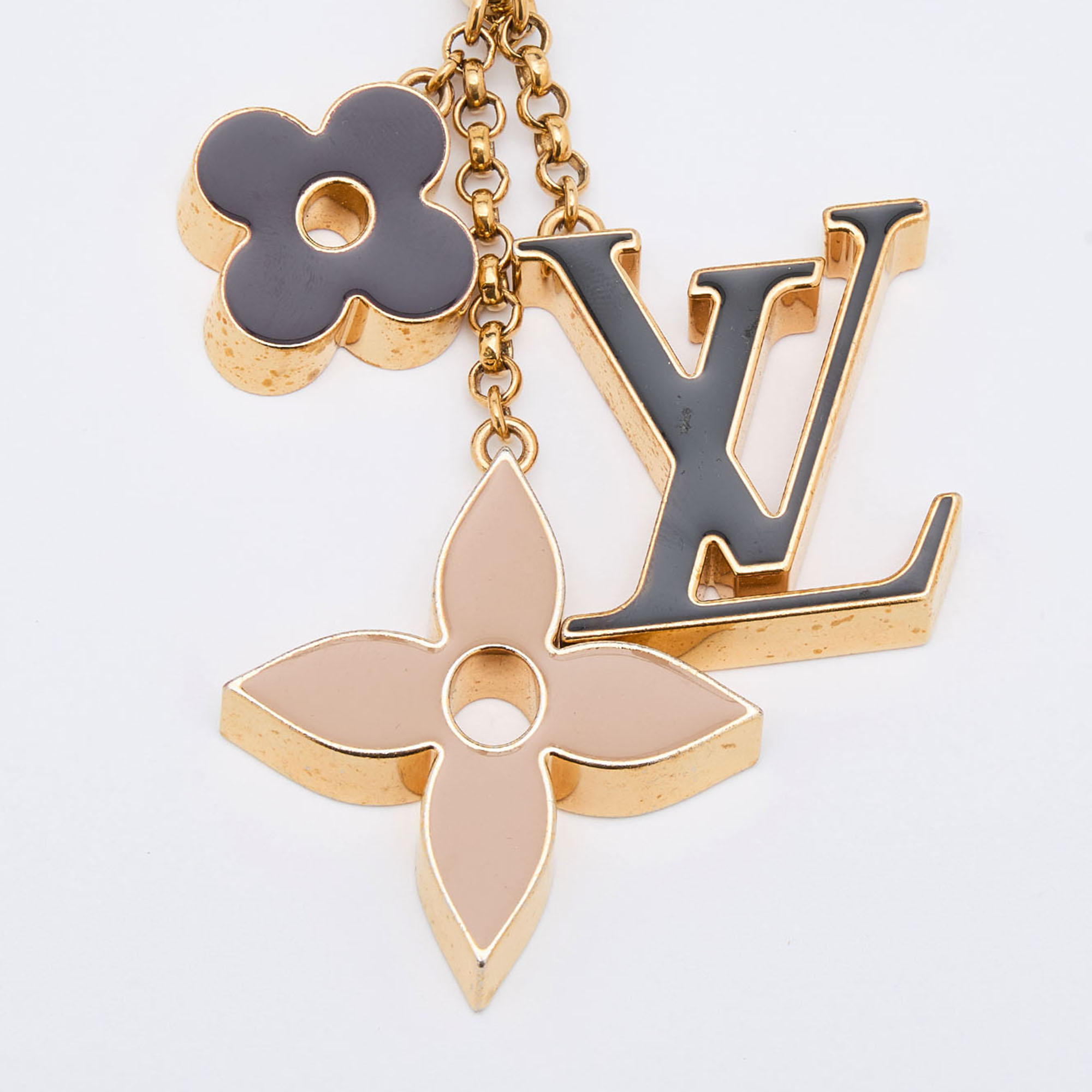 

Louis Vuitton Gold Tone Fleur de Monogram Bag Charm, Multicolor