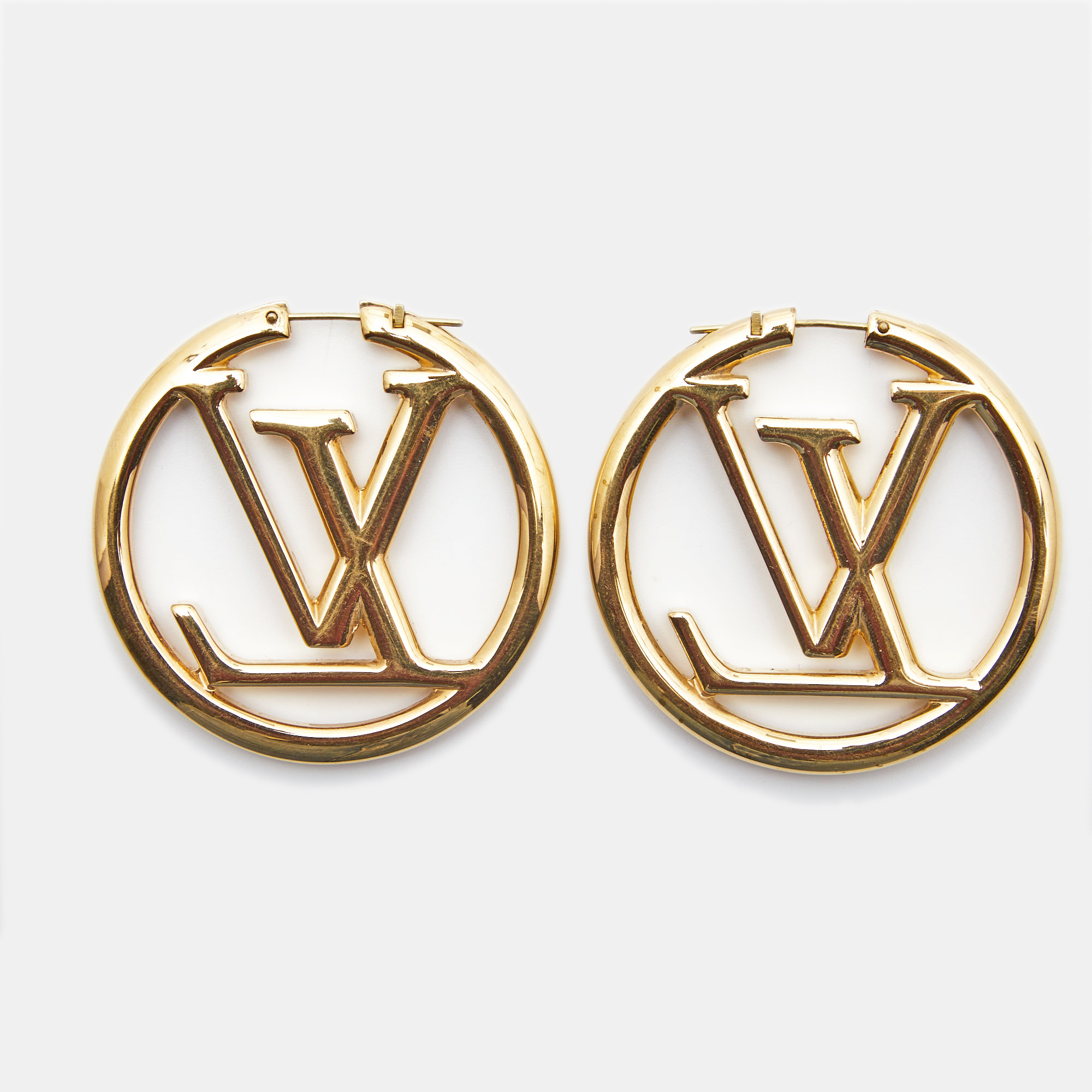 

Louis Vuitton Louise Gold Tone Hoop Earrings