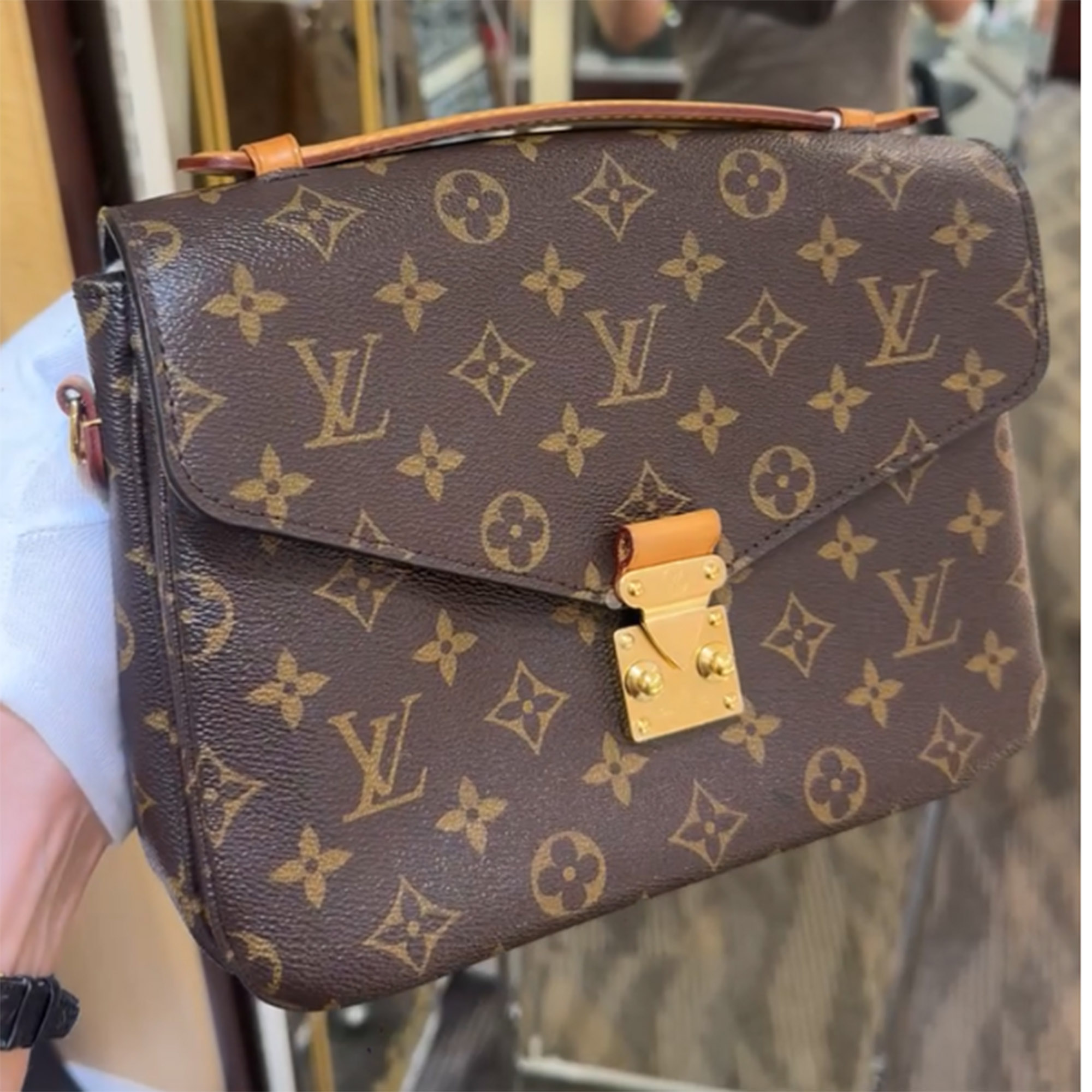 

Louis Vuitton Monogram Pochette Metis Bag, Brown