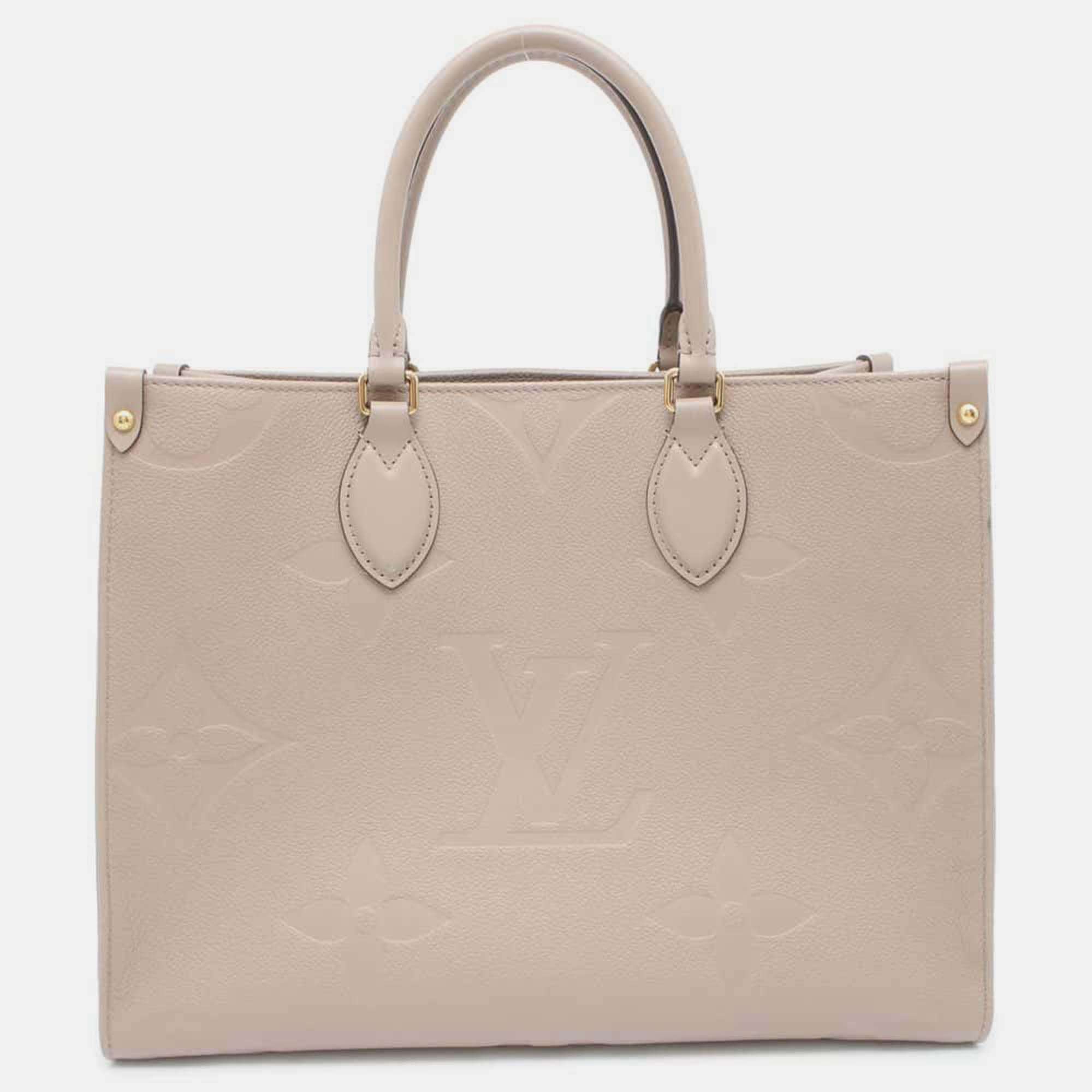 

Louis Vuitton Tourterelle Monogram Empreinte Leather Onthego MM Tote Bag, Beige